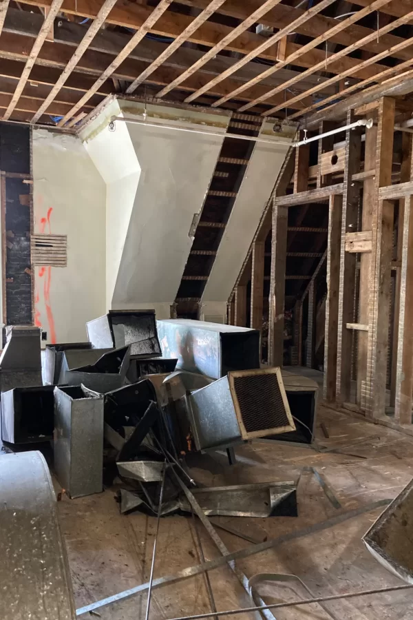 Now gutted and used to store ventilation ducts that will be discarded, this once was an office on Chase Hall's second floor. (Doug Hubley/Bates College)