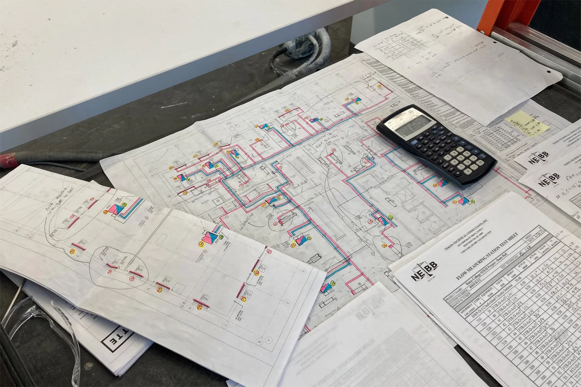 These documents support the HVAC testing and balancing efforts of a Tekon Technical Consultants engineer at Dana Hall. (Doug Hubley/Bates College)