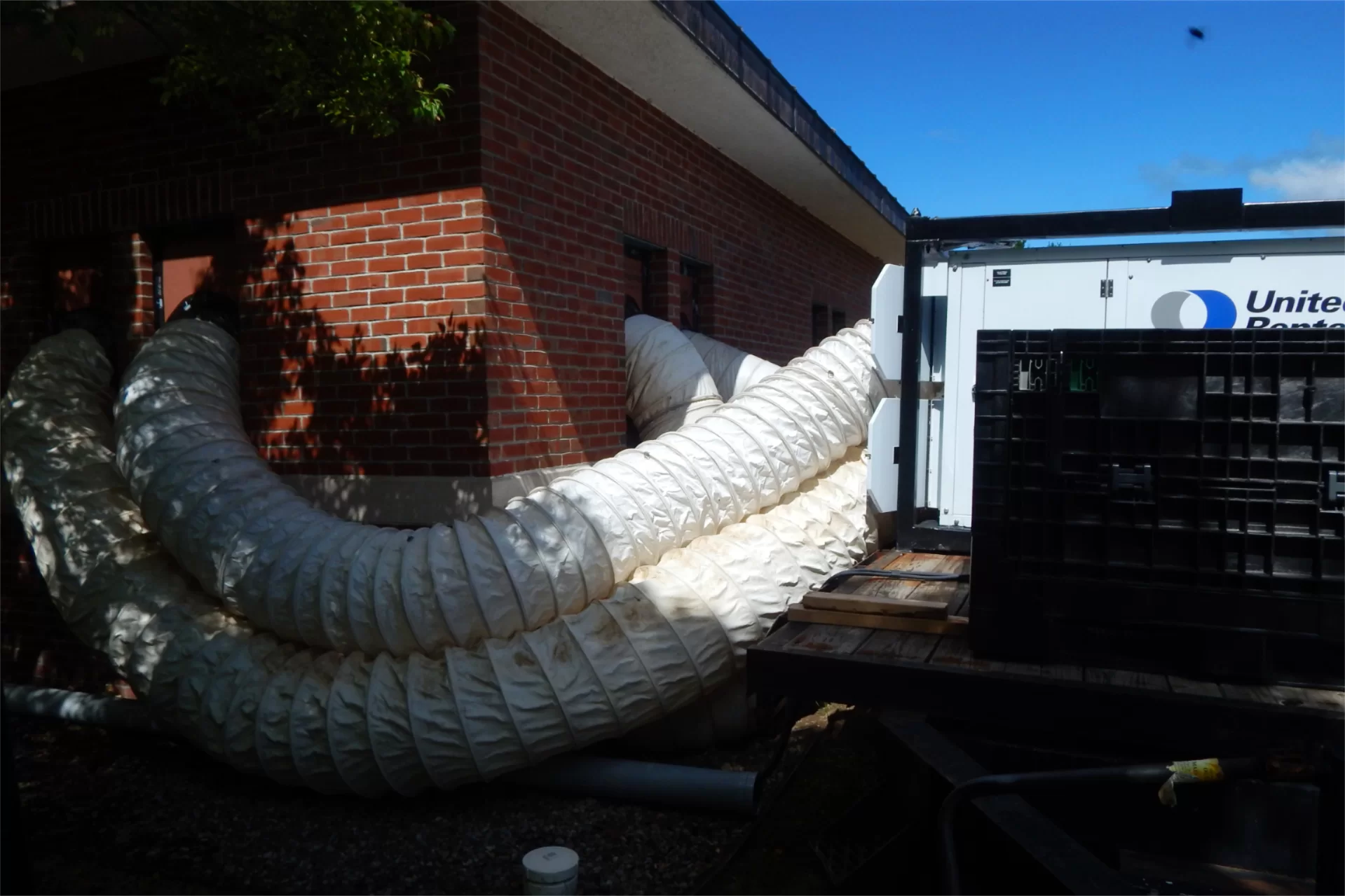 A temporary HVAC unit is serving the Olin Arts Center while the facilitiy's own system is being replaced. (Doug Hubley/Bates College)