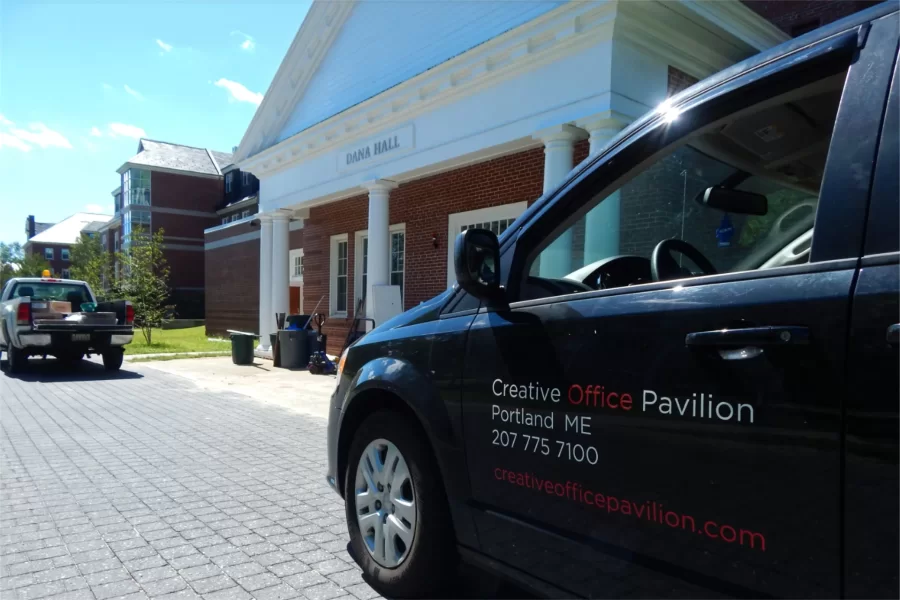 A furniture supplier's car is among vehicles parked at Dana Hall on Aug. 3. (Doug Hubley/Bates College)