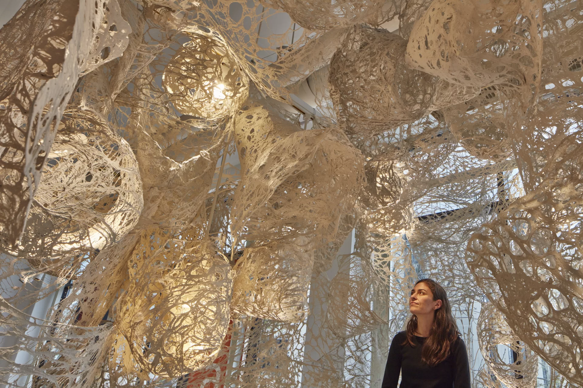 Katy Rodden Walker '07, inside her installation, "Enmeshed." Photo by Charles Mayer Photography.
