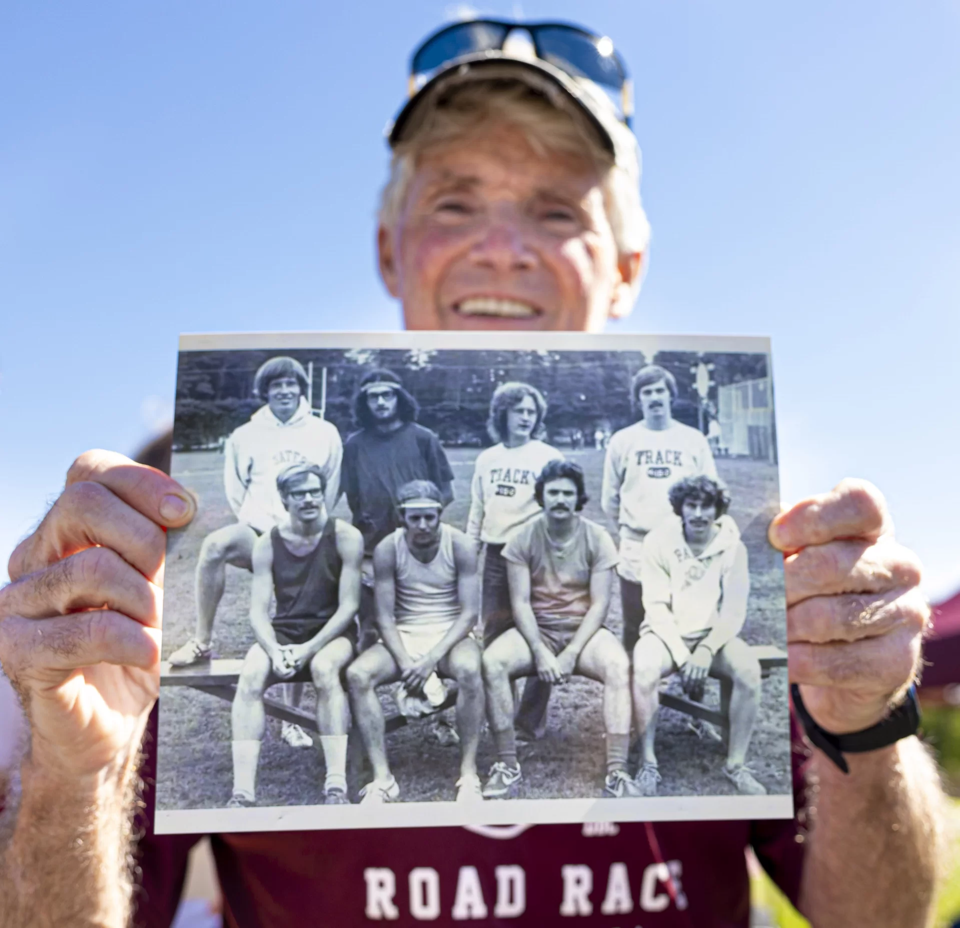 A remarkable seven decades worth of Bobcat harriers descended upon the Bates College campus Saturday (some for the first time in years) as the institution's storied cross-country program came together to celebrate the 50th annual Alumni Meet.
Before the meet began, head women's and men's track and field coach Curtis Johnson spoke to the attendees.

"I want to thank you all for joining us for the 50th annual running of the Alumni race," Johnson said. "Bates is making a lot of upgrades that we're proud about. The biggest thing I can say is that a lot of this is because of all of you. So, I want to thank you all for helping to celebrate this moment. This is a true testament of the Bates community. How we always give back, we support, we show up consistently. And, regardless of when you graduated, you get a chance to show that you are a Bobcat forever."

Nearly 100 alumni donned the garnet and white and toed the starting line for this historic event, a group speckled with participants from the very first outing way back in 1973.