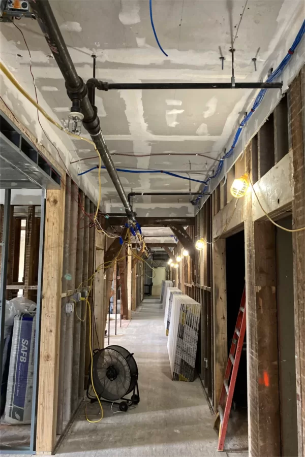 Stockpiled building materials and new ceilings on the second floor. (Doug Hubley/Bates College)