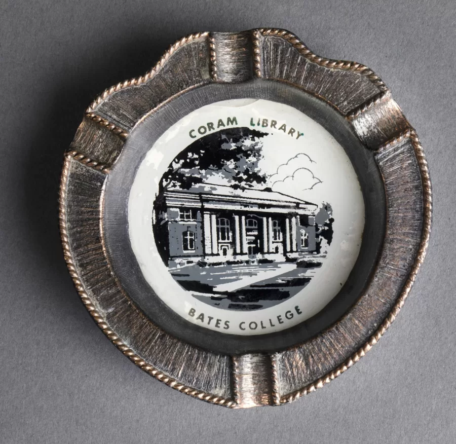 Objects from the Edmund S. Muskie Archives, photographed in the BCO studio at 141 Nichols Street, on July 19, 2018.

Ash tray, metal edged with image of Coram Library on bottom; belonged to Melvin and Natalie Gulbrandsen, class of
1942. undated

Drawer
19 303