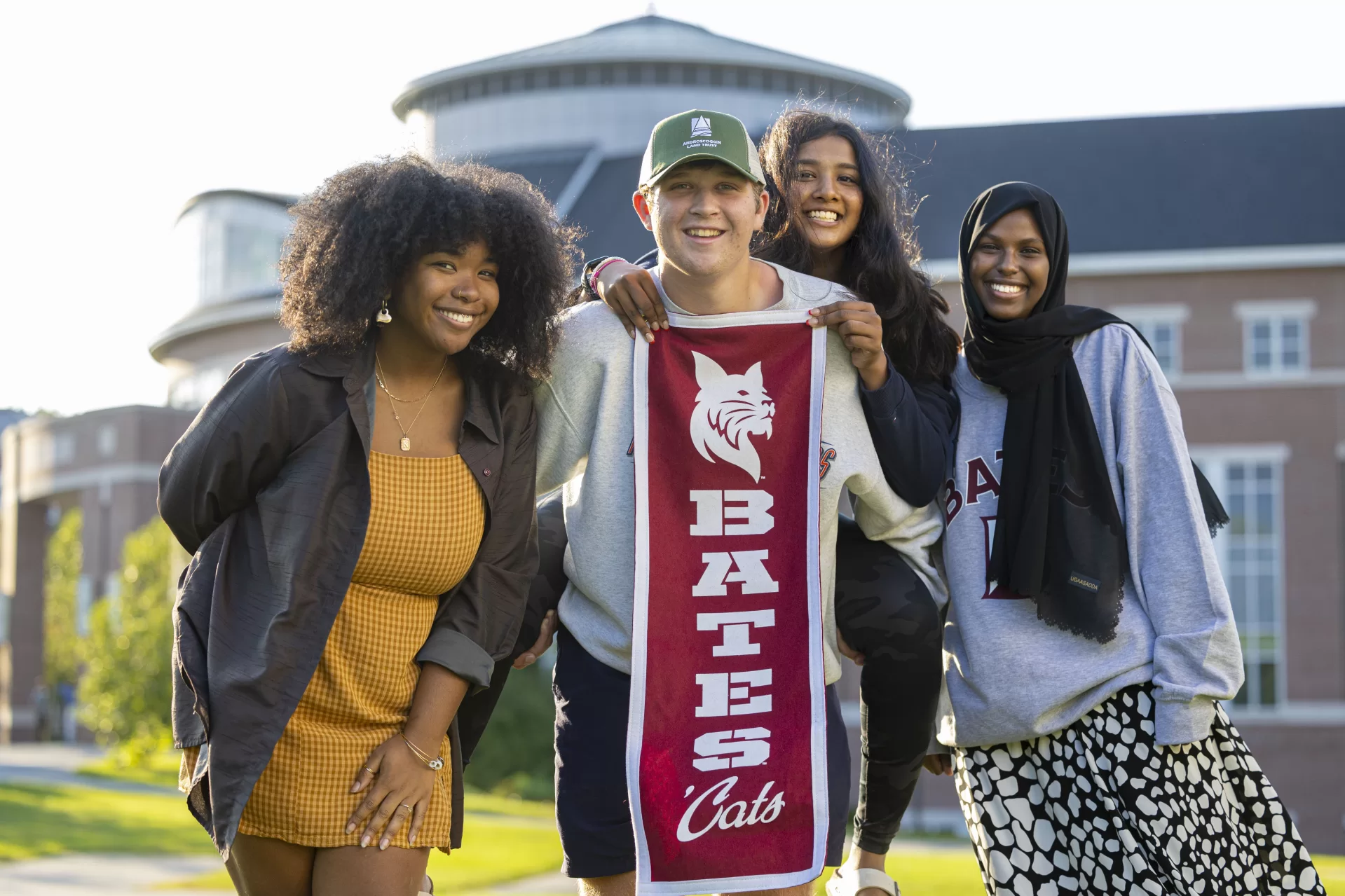 They are plugged into local work!

Bonner Leaders Kara Neal '25 of Washington, D.C., and Honolulu; Robert Washburne '26 of Madison, Conn.; Sivani Arvapalli '26 of South Windsor, Conn.; and Anzal Isaak '26 of Lewiston, Maine, posed for a group portrait this afternoon outside of the Bates Volunteer Fair held in the Bardwell Street Tent. Pettengill Hall provides a backdrop.

Sponsored by the @harwardcenter for Community Partnerships, annual gathering provides Bates students with the opportunity to meet local organizations and learn about opportunities in the community.

Swipe left for additional scenes including Bates students, faculty, and staff along with members of the local community.

The Bonner Leader Program is an opportunity for students with a passion for community service and civic engagement. They spend four fours each week working with community partners in the Lewiston/Auburn area.