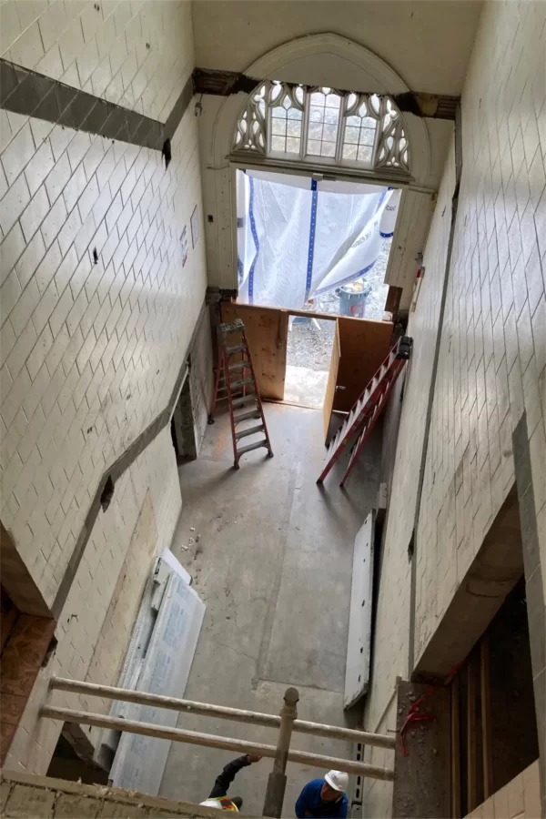 This space once housed stairs connecting the three levels of the original 1919 Chase Hall. Still a main entrance to the building but with stairwise access moved elsewhere, it will be repurposed as an atrium. (Doug Hubley/Bates College)