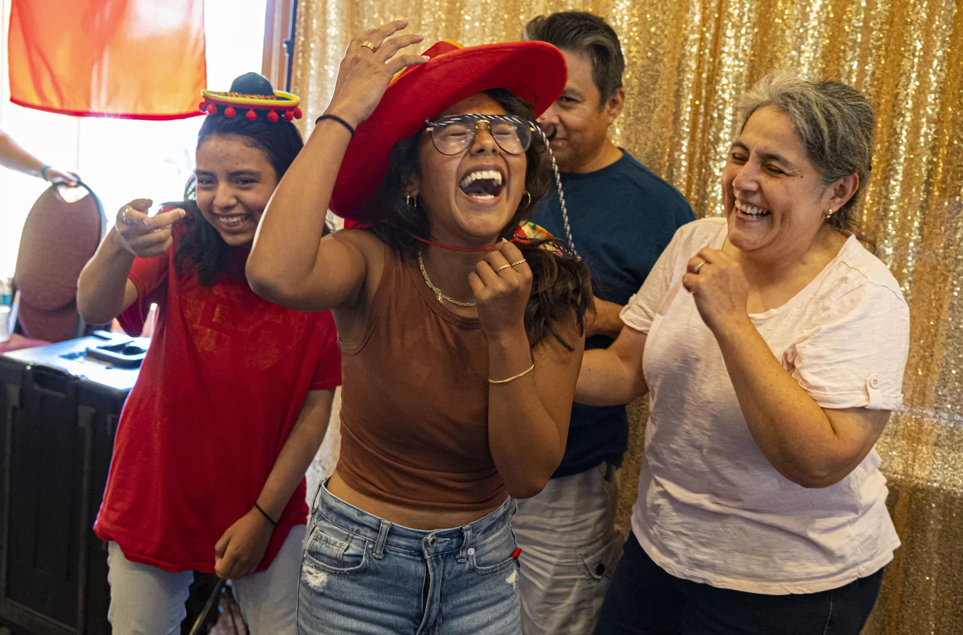 “It was so wonderful to have my family come down. We drove all the way from Chicago. We were very tired. And a little anxious about the move. But once we saw the photo booth and got a little bit more comfortable with everyone here and all the encouragement and welcome, we had so much fun creating these memories as my parents probably won’t be around until graduation. So we get to see where I’m starting. And I’m very excited to see where I end up at the end of it.”— First-year student Nailah Estrada of Chicago, a member of the Bobcat First Program (B1st), enjoys a photo booth session with her younger sister Maricela and their parents Simon and Maricela in the Benjamin Mays Center.The activity afforded B1st participants the chance to create lifetime memories with the production of instant photography during the Parents Sessions held on the first day of the Bobcat First Pre-Orientation Program that runs from Aug.28-30.The Bobcat First Program fosters the success of first-generation college students through co-curricular activities, events, workshops, and peer connections. They create a welcoming environment and strive to develop all of their students into life-long learners.Program participants will gain knowledge and skills that will empower them to grow academically, personally, and professionally.B1st is committed to supporting the dreams of students and provides opportunities for academic development and learning experiences both inside and outside of the classroom. The program builds community while helping students to feel a sense of belonging. The program is guided by Dr. Ray Grant, the Assistant Dean for First Generation and Bobcat First Programs.Swipe left to see more photographs from the pre-orientation first two days, including a welcome from President Clayton Spencer, sessions on academics, financial aid, and student life, and community building activities.