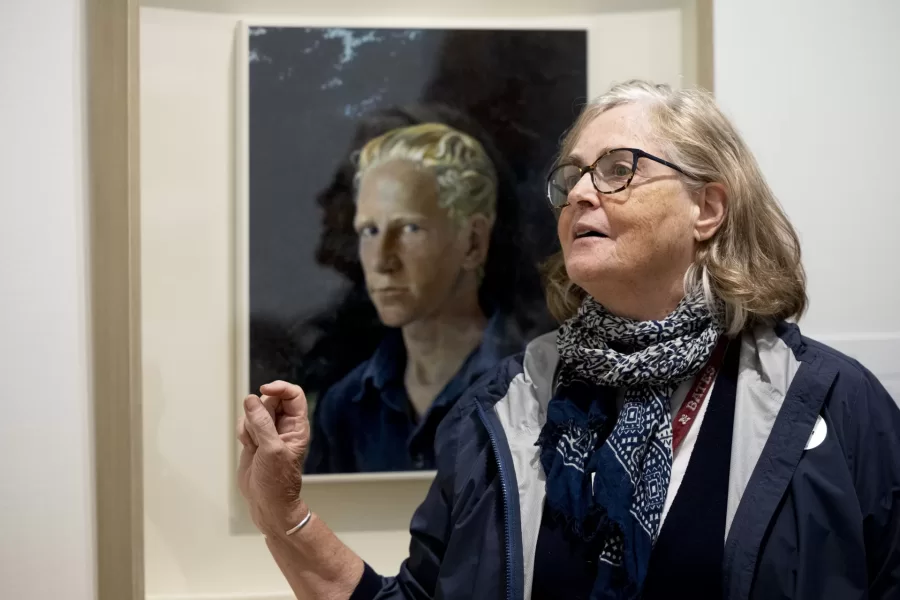 Professor Emerita of History Margaret Creighton gestures in front of Andrew Wyeth’s 1938 tempera painting “Young Swede,” at the Farnsworth Museum in Rockland, Maine. (Phyllis Graber Jensen/Bates College)