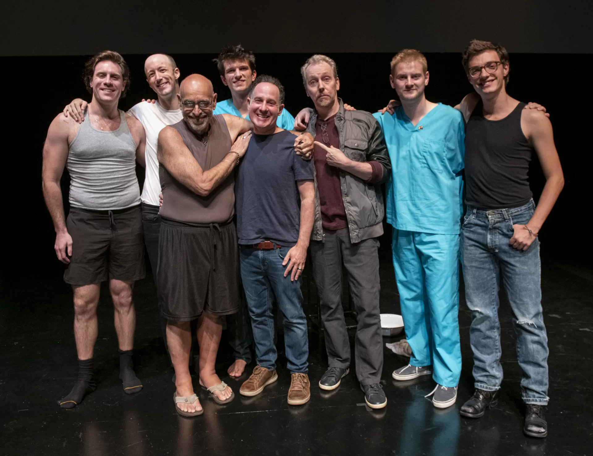 Jonathan Adler'00, center, stands with the cast of his play, "Reverse Transcription". Photo courtesy of Jonathan Adler.