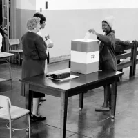 Negro voting in Cardoza [i.e., Cardozo] High School in [Washington,] D.C. / [MST].SummaryPhotograph showing a young African American woman casting her ballot.Trikosko, Marion S, photographer. Negro voting in Cardoza i.e., Cardozo High School in Washington, D.C. / MST. Washington D.C, 1964. Nov. 3. Photograph. https://www.loc.gov/item/2003688167/.