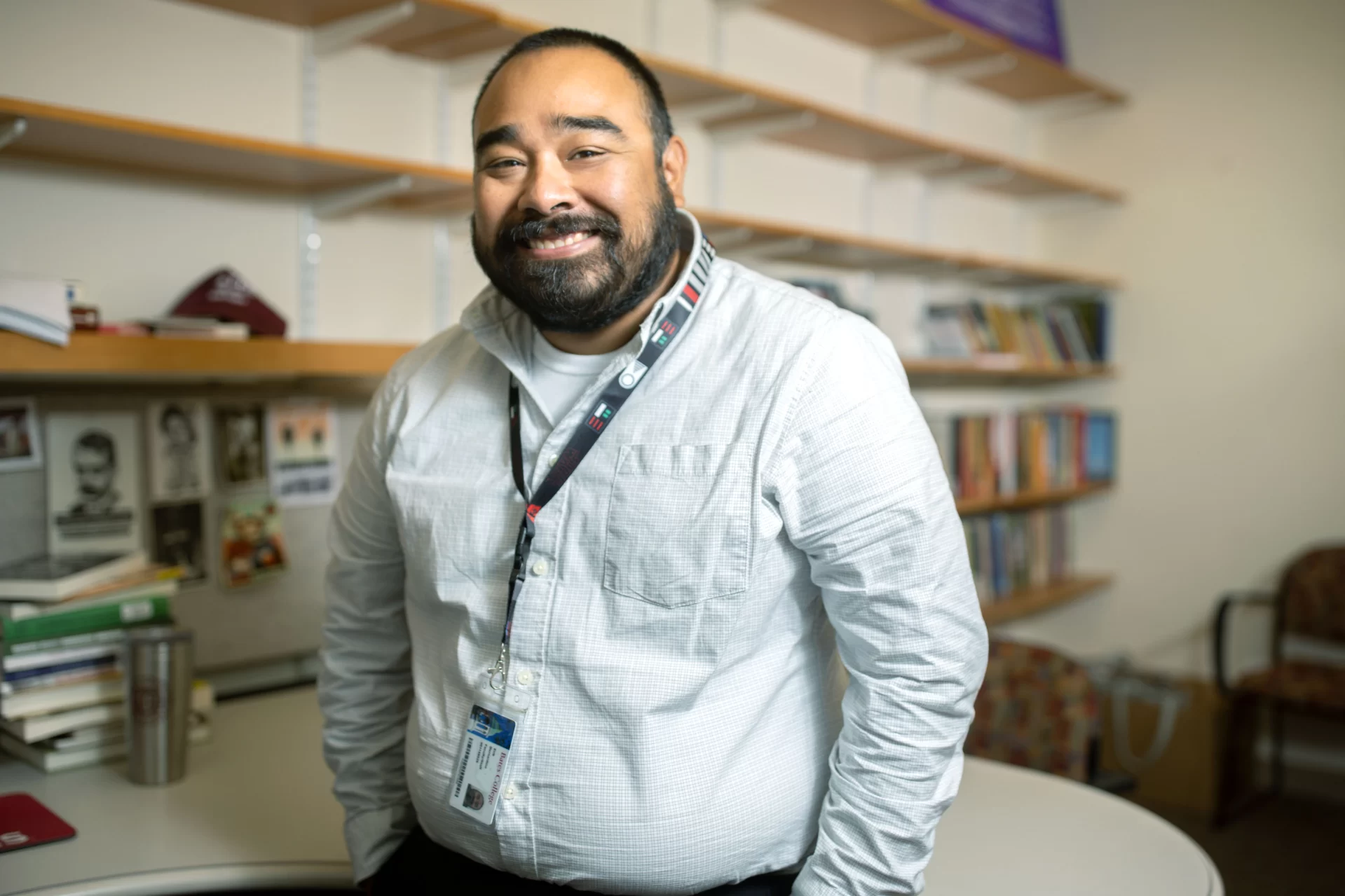 Assistant Professor of History Erik Bernardino poses in his office, Pettengill 104.