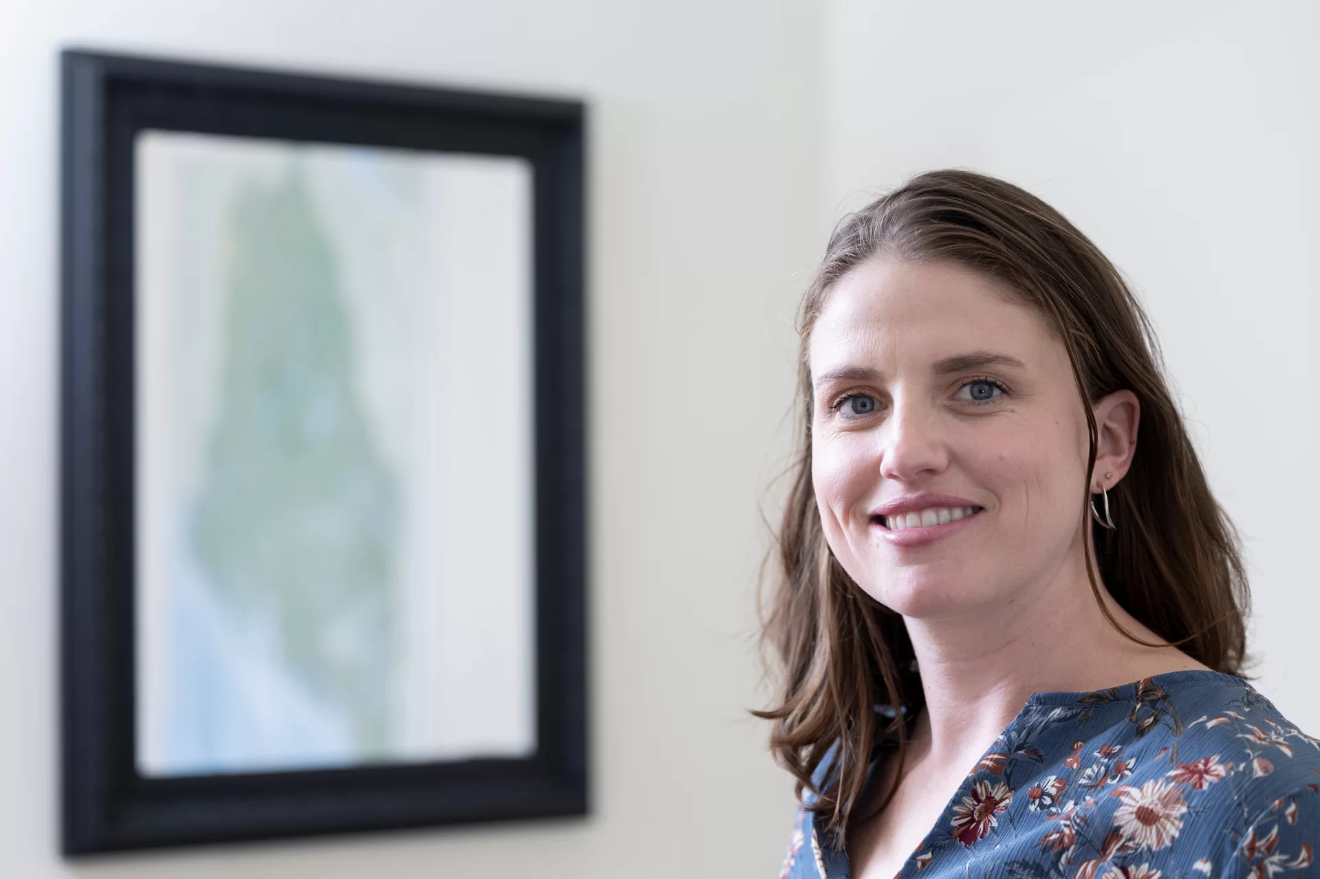 Assistant Professor of Economics Amanda Lindsay in her Pettengill Hall office, Room 266.