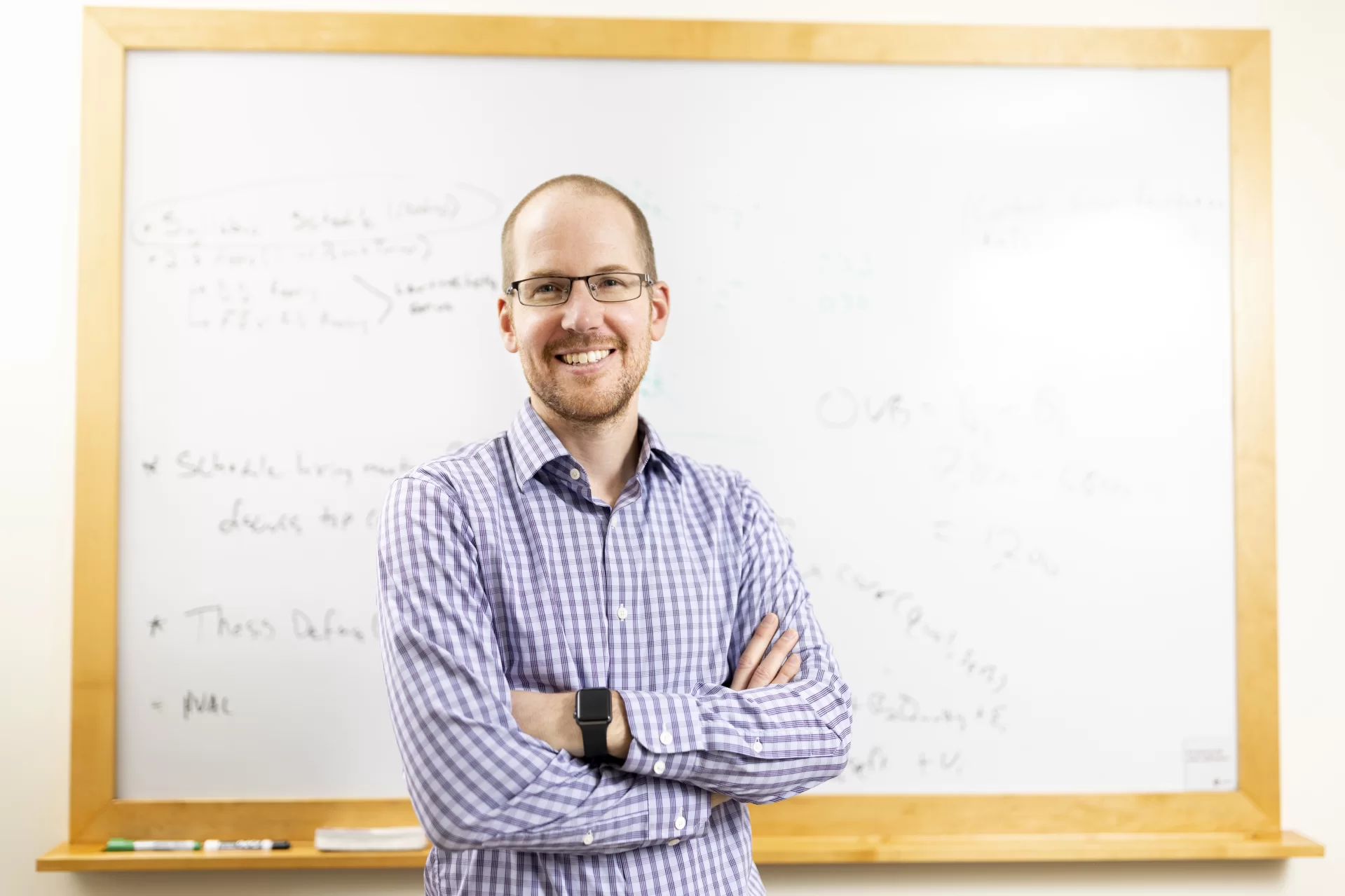 Associate Professor of Economics Austin Smith in his Pettengill Hall office, Room 272.