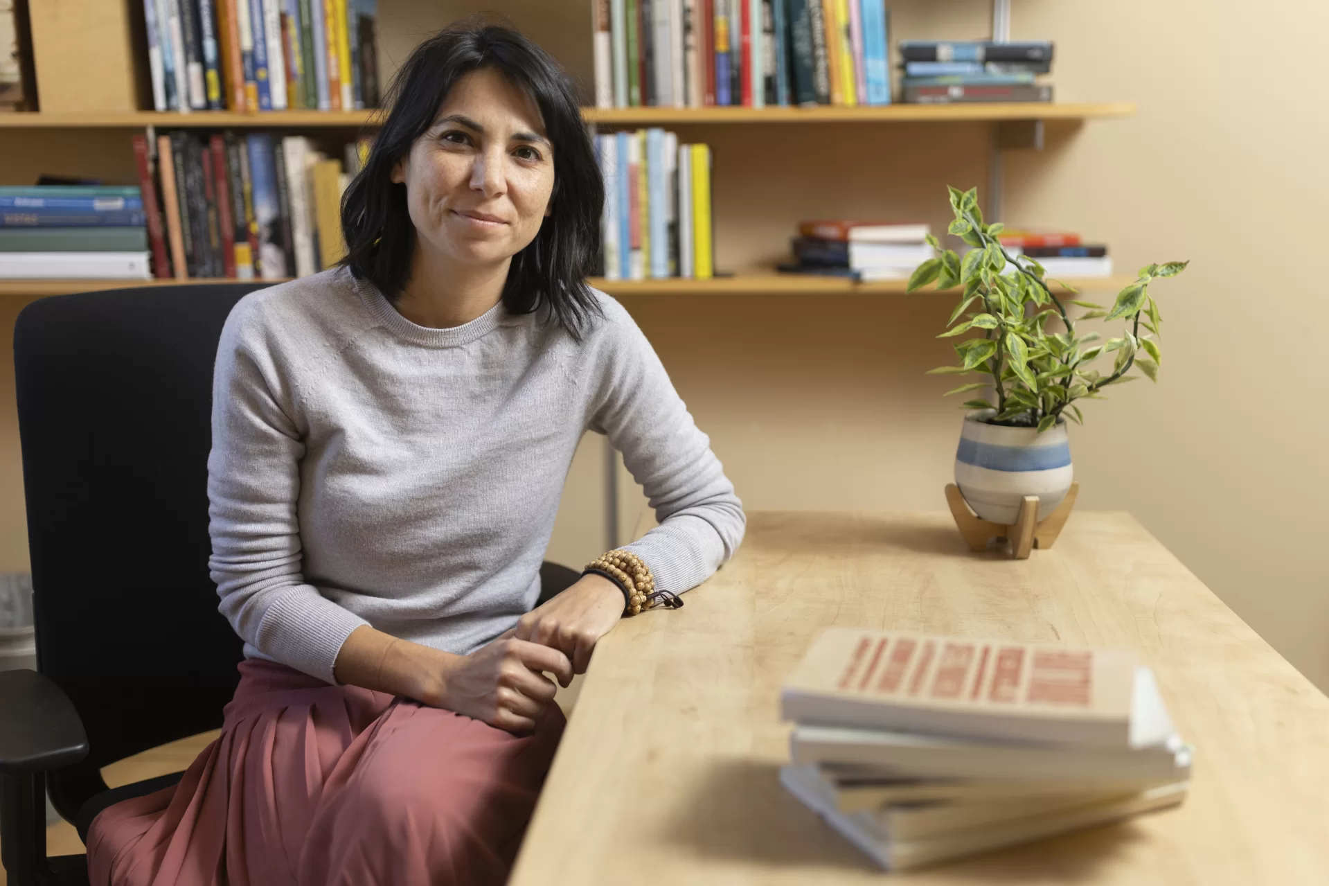 Assistant Professor of Environmental Studies Jamie Haverkamp poses in her Hedge Hall Room 111 office.