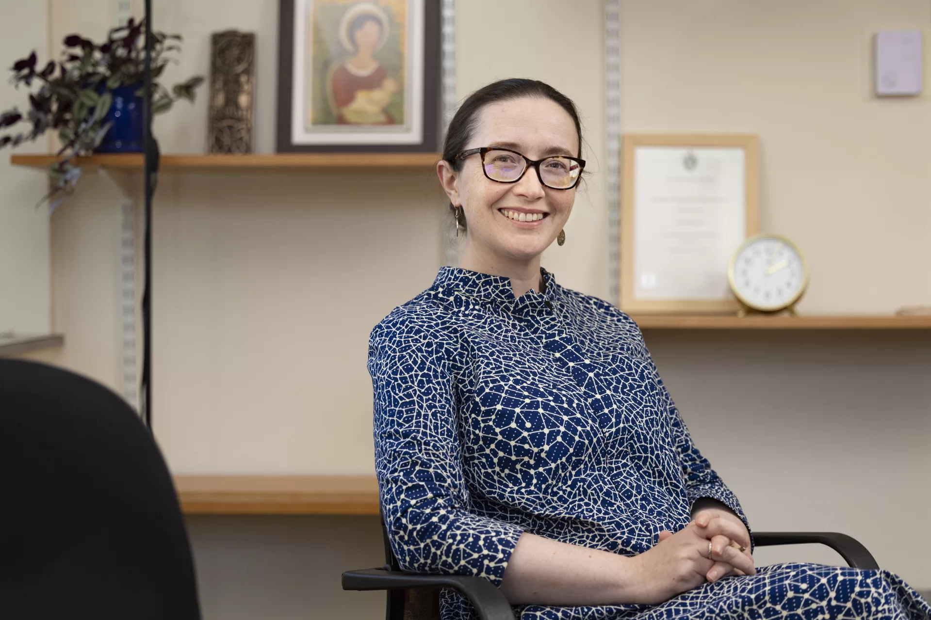 Assistant Professor of Classical and Medieval Studies Sarah Lynch,  poses in her Pettengill Hall Room 102 office.