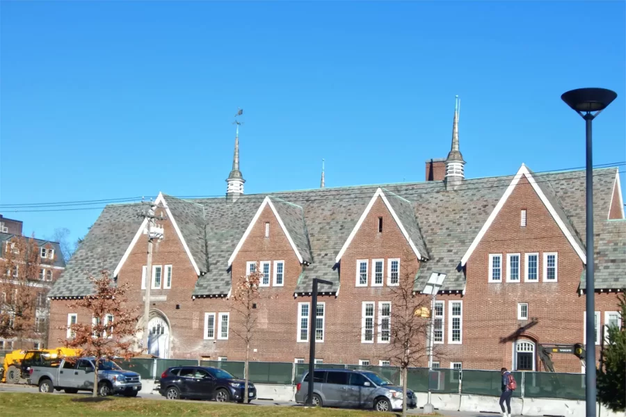 Chase Hall behind the construction fence in December 2022. (Doug Hubley/Bates College)