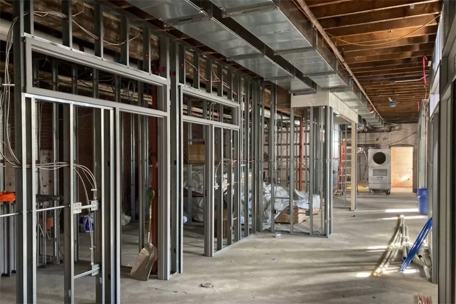 Wall framing and utility rough-ins for forthcoming Student Affairs offices in the former College Store, which was relocated to then-new Kalperis Hall in 2016. (Doug Hubley/Bates College)