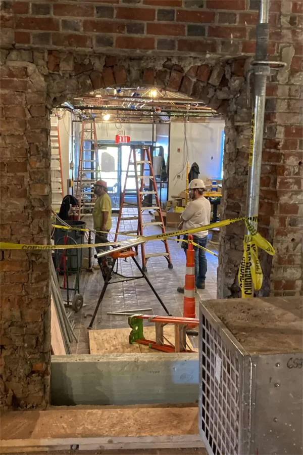 Here's a view from the other side of the arched doorway seen in the previous image, facing the Chase Hall lobby and the doors to the Chase-Carnegie courtyard. (Doug Hubley/Bates College)