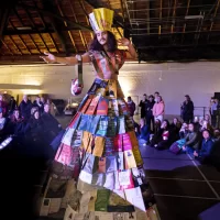 The Trashion Show, including Harvest Meal desserts served by Bates College Dining in Commons on Nov. 16, 2022, was held in the Christian Daggett Gray Athletic Building.Contestants:First Place: Miguel Pacheco '24, wearing stilts and a dress made of recycled book covers, created by Sloan Phillips '25.Second Place: Bora Lugunda '25, wearing a Marie Antionette-inspired gown made from trash bags and plastic sheeting, and a hat made from cardboard and brown packing paper, created by Grace Acton '24Third place: Claire Barlass '25, wearing a self-designed "milk dress" made from discarded milk cartons from Commons, an outfit that was also her Halloween costume this year.Quinn Macauley '24, wearing a "mermaid-inspired" outfit made from trash/discarded swim gear from Tarbell Pool, created by Talia Skaistis '25 and Lianna Rosman '26, all three students are on the Bates Swimming and Diving TeamLily Ritch '25, wearing a "puffy jacket-inspired" outfit made from discarded bubble wrap, chip bags, coupons, mesh orange bag, and straws, created by Emma Righter '23, and accessories by Ella Lungstrum '23 .Leen Dockery '26, wearing a self-created cowgirl-inspired outfit made from discarded cardboard from the Parker 4th floor recycling bin. (I didn't recognize her in the outfit! I remember her from the Visio Divina photos) (edited) 3:39Let me know if you want the self-written descriptions for their outfits. I have the script Theo shared, and I can pick them out (there were a lot of withdrawals, I guess! There are like 13 names on the script)Plus one more male contestant:7. As Abraham Lincoln once said: there is nothing like a sour patch kid to brighten your day! In this issue of munchies, Henry Welch, Ben Huston, and Jonah Yaffee design a chic, yet delicious outfit of sour patches, chips, goldfish bags, and other assorted snacks to express the intrinsic human primal desire for food, and boy does it look good.