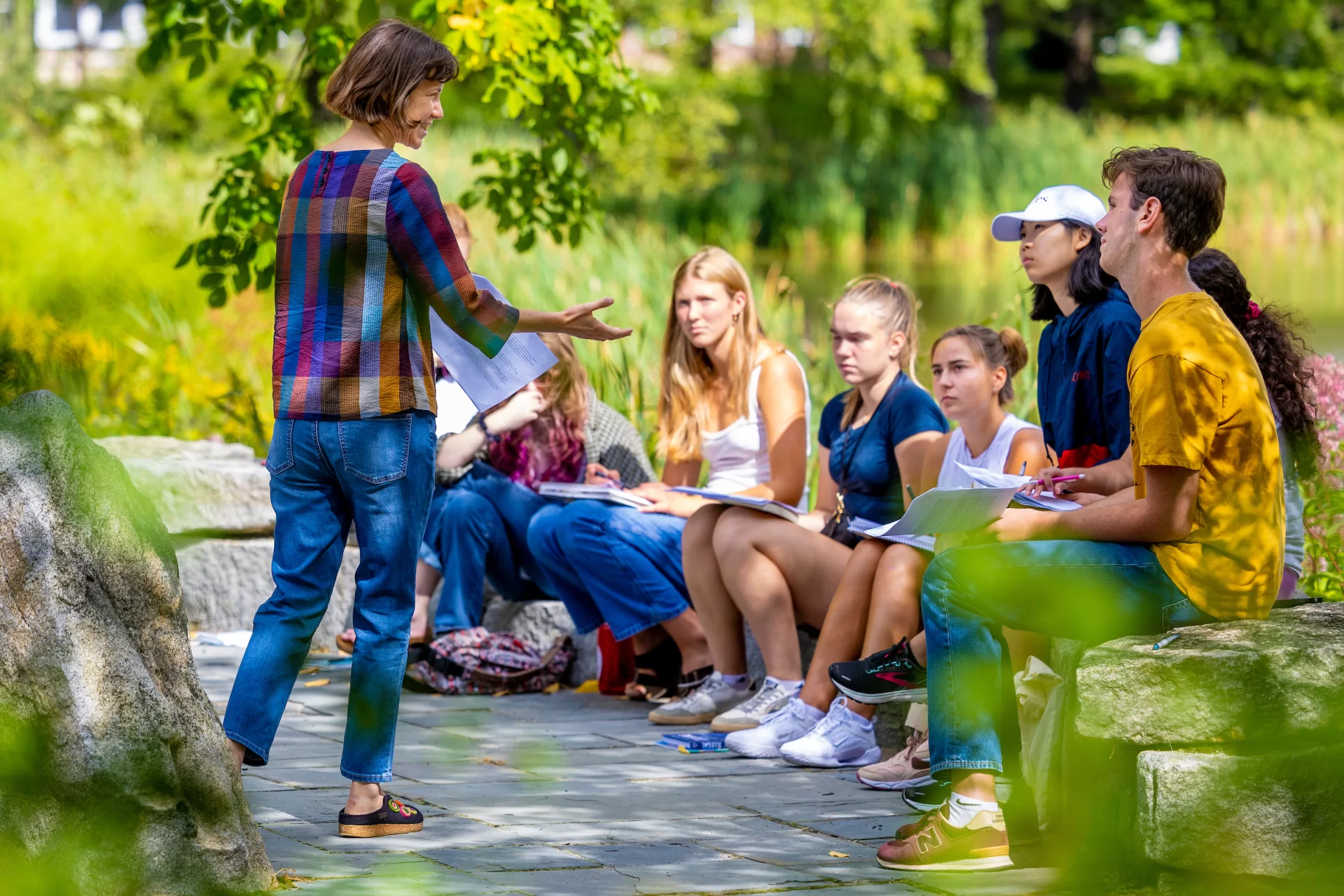 “It was a great day to be talking under the trees.”

— Associate Professor of History Joe Hall, describing the first meeting of his first-year seminar, “This Land is Whose Land?” on the Historic Quad.

The class, along with all other first-year seminars, met for the first time on Thursday morning, Sept. 1, 2022, as an opportunity for classmates to connect with each other and their instructor, who will also serve as their first-year advisor.

Swipe left for a few additional moments from yesterday’s first-year seminars, including:

“Beyond Nelson Mandela: Themes and Personalities in South African History,” taught by Assistant Professor of History Patrick Otim;

“Arts and Spirituality: Art Making and Aesthetic Experience as Conduits for Reflection and Connection,” taught by Lecturer in the Humanities and Multifaith Chaplain Brittany Longsdorf; and

“Reading Refugees and Migration in European Children’s Literature,” taught by Associate Professor of German Raluca Cernahoschi.