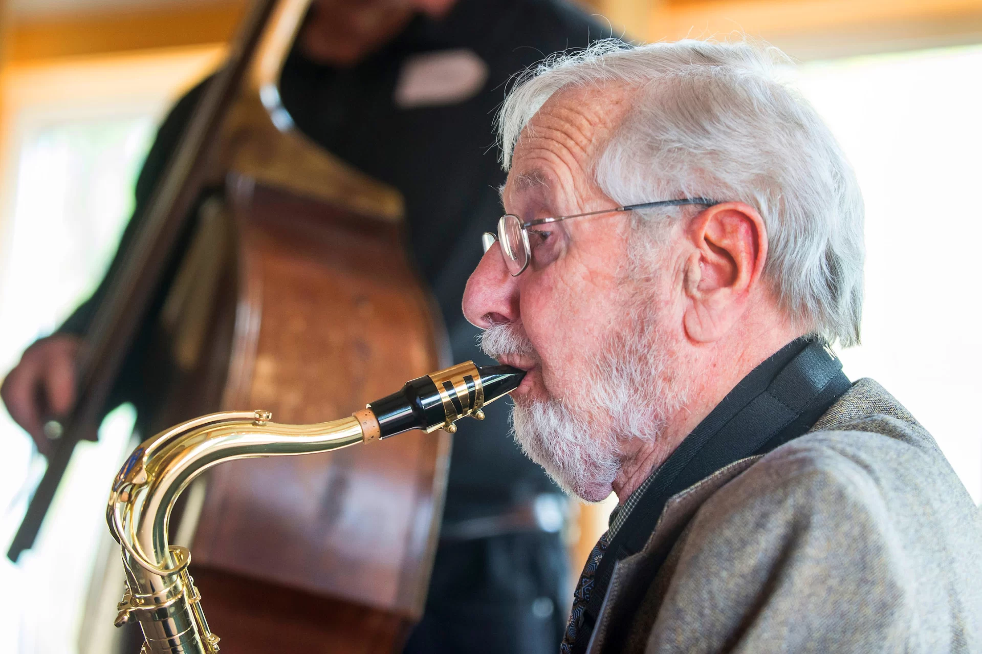 Lou Scolnik '45 is still blowing his horn, joined by Physics professor John Smedley on guitar and area bassist Tim Clough on bass.
Surviving members of the Bates V12 Naval program have their annual meeting on Friday October 2 2015 in the Benjamin Mays Center.