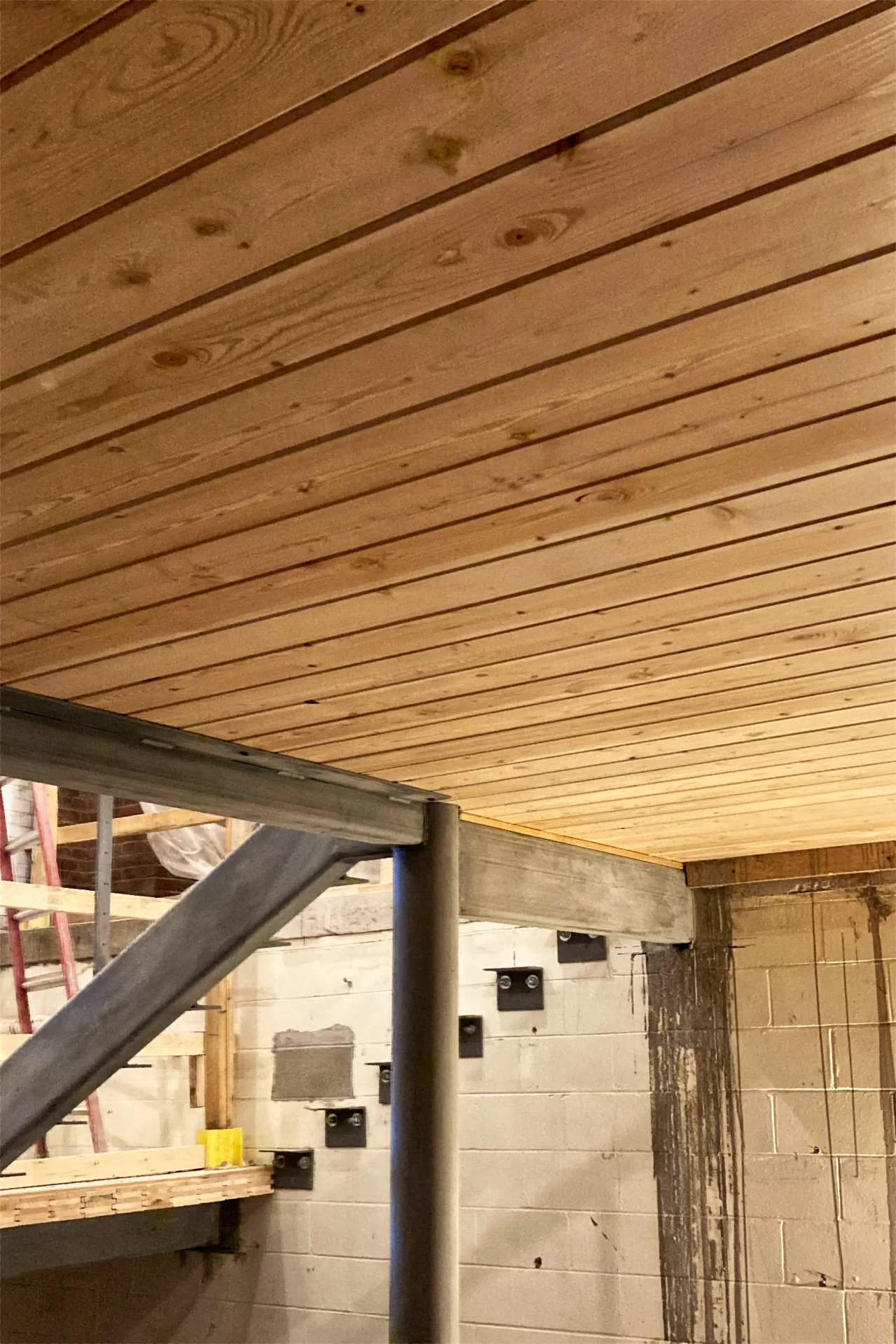 Shown overhead from a central stair walkway is a run of Lock-Deck cross-laminated timber flooring. (Doug Hubley/Bates College)