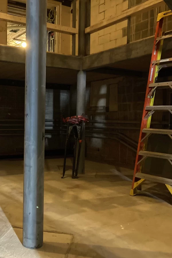 The central stair rises from this part of Chase Hall’s ground floor, once upon a time used by the College Store. (Doug Hubley/Bates College)