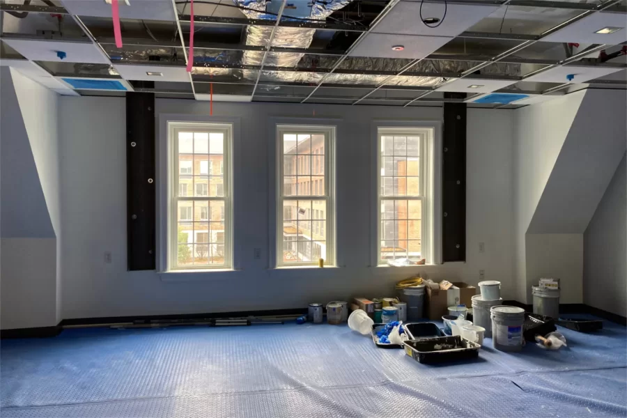 A student meeting area on the second floor of Chase Hall. This was the space in which much of the floor decking next to the windows needed to be replaced because of water damage. (Doug Hubley/Bates College)