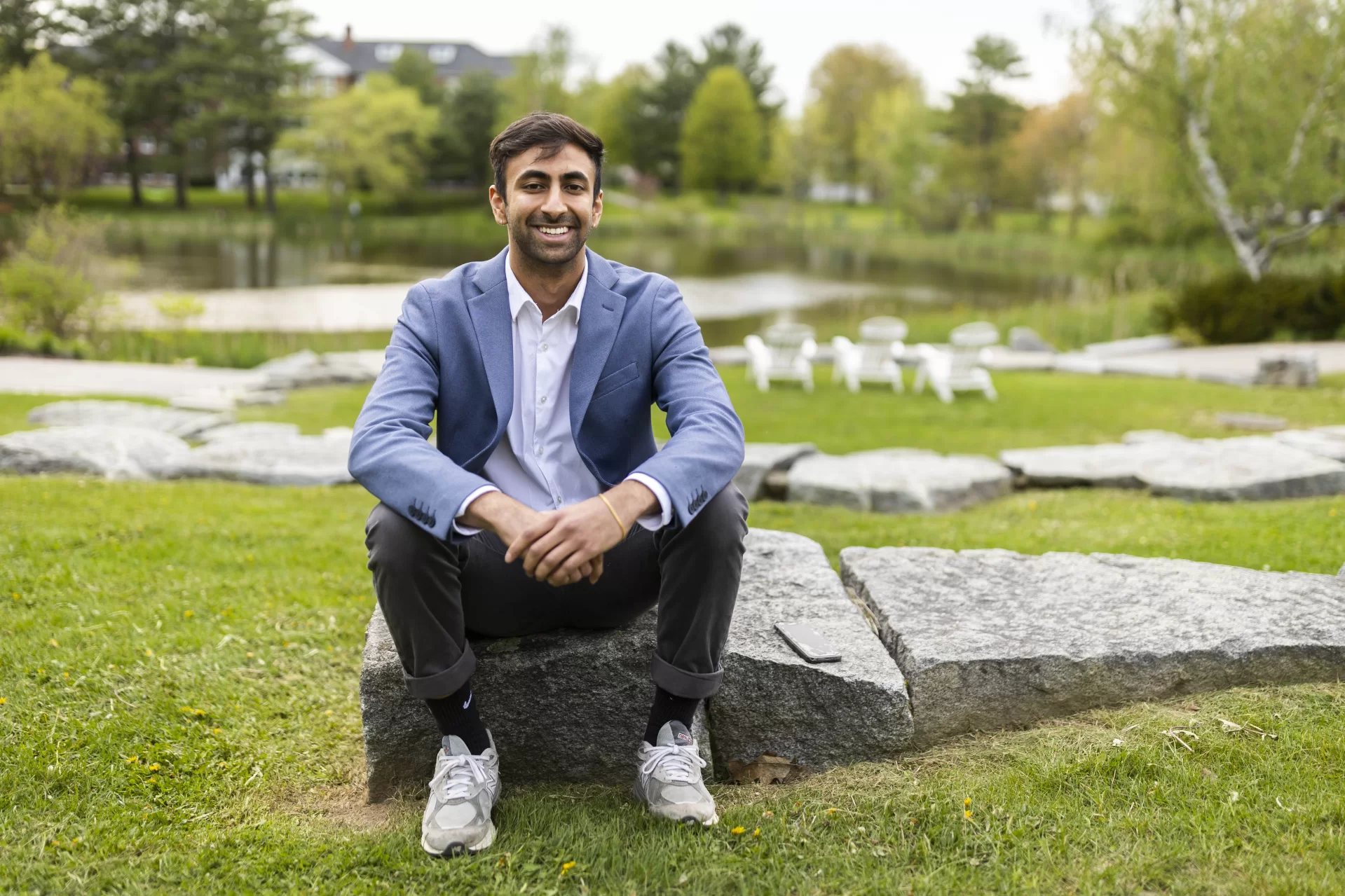 Rishi Madnani ’23 of Langhorne, Pa., senior commencement speaker for the Class of 2023, poses for a portrait in the Keigwin Amphitheater overlooking Lake Andrews,
