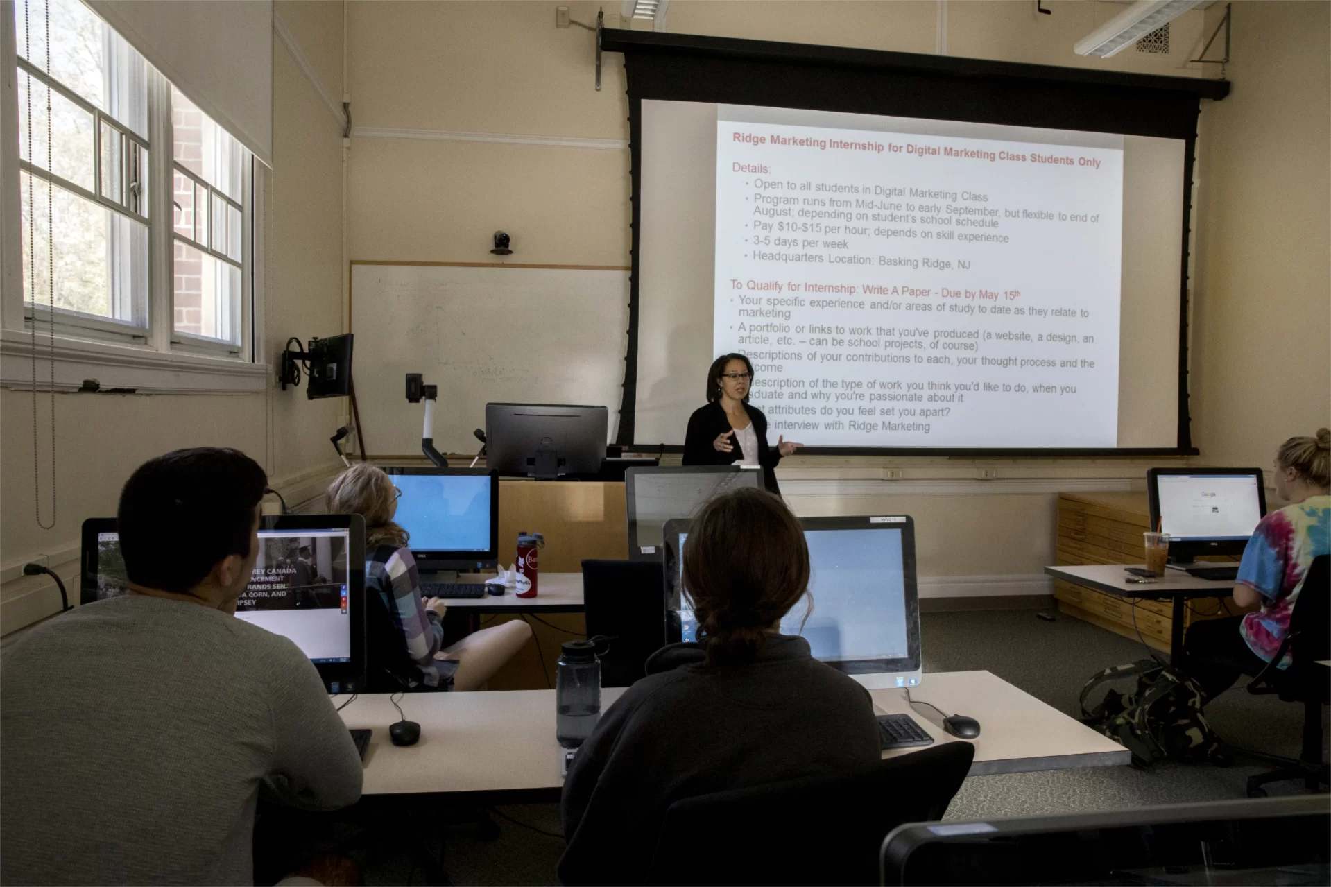 Here’s Coram 110 in action in 2017, as Ashley Hart '91 leads a digital marketing course during Short Term. During summer 2023, this space will be converted to an immersive media studio. (Phyllis Graber Jensen/Bates College)