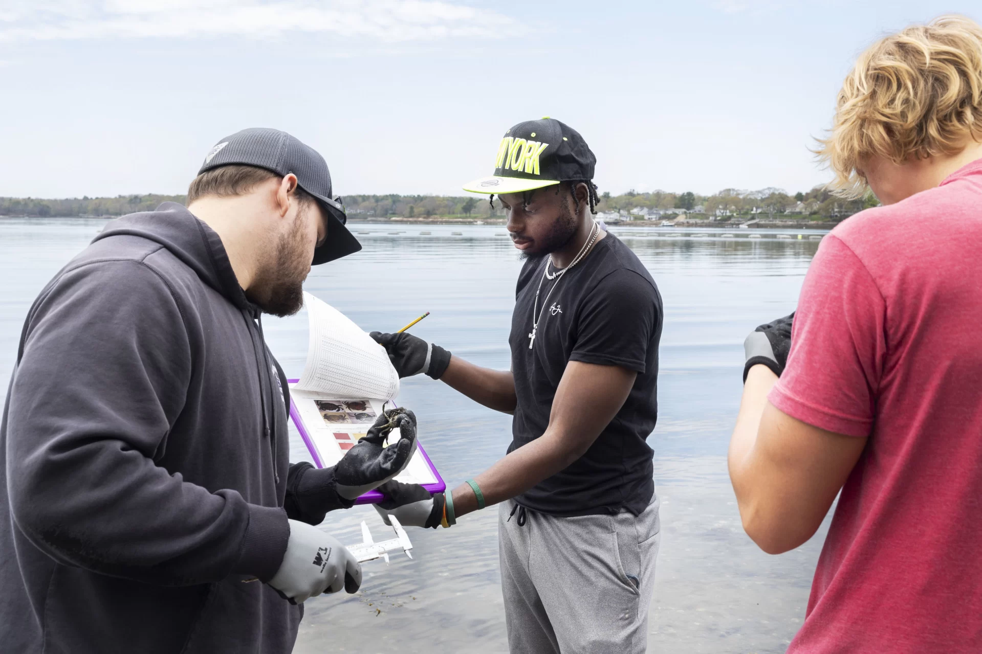 Lecturer in Biology Jesse Minor ’00 takes students in his Short Term on invasive green crabs to Cousins Island in Yarmouth for inventory monitoring and site assessment field trip.

Jessie Batchelder from Manomet joined them.