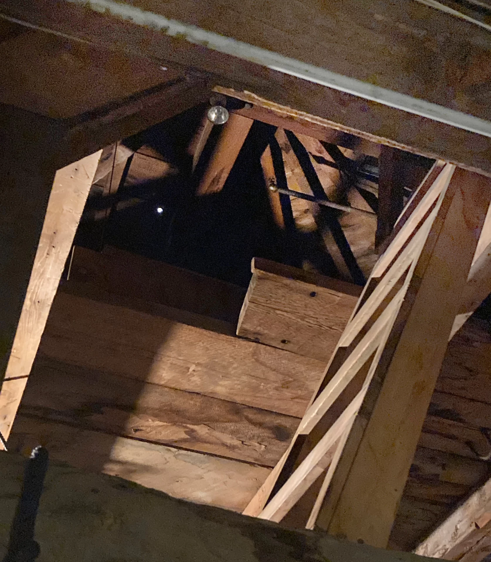 The ladder at lower right leads to the Hathorn Hall belfry, at center. (Doug Hubley/Bates College)