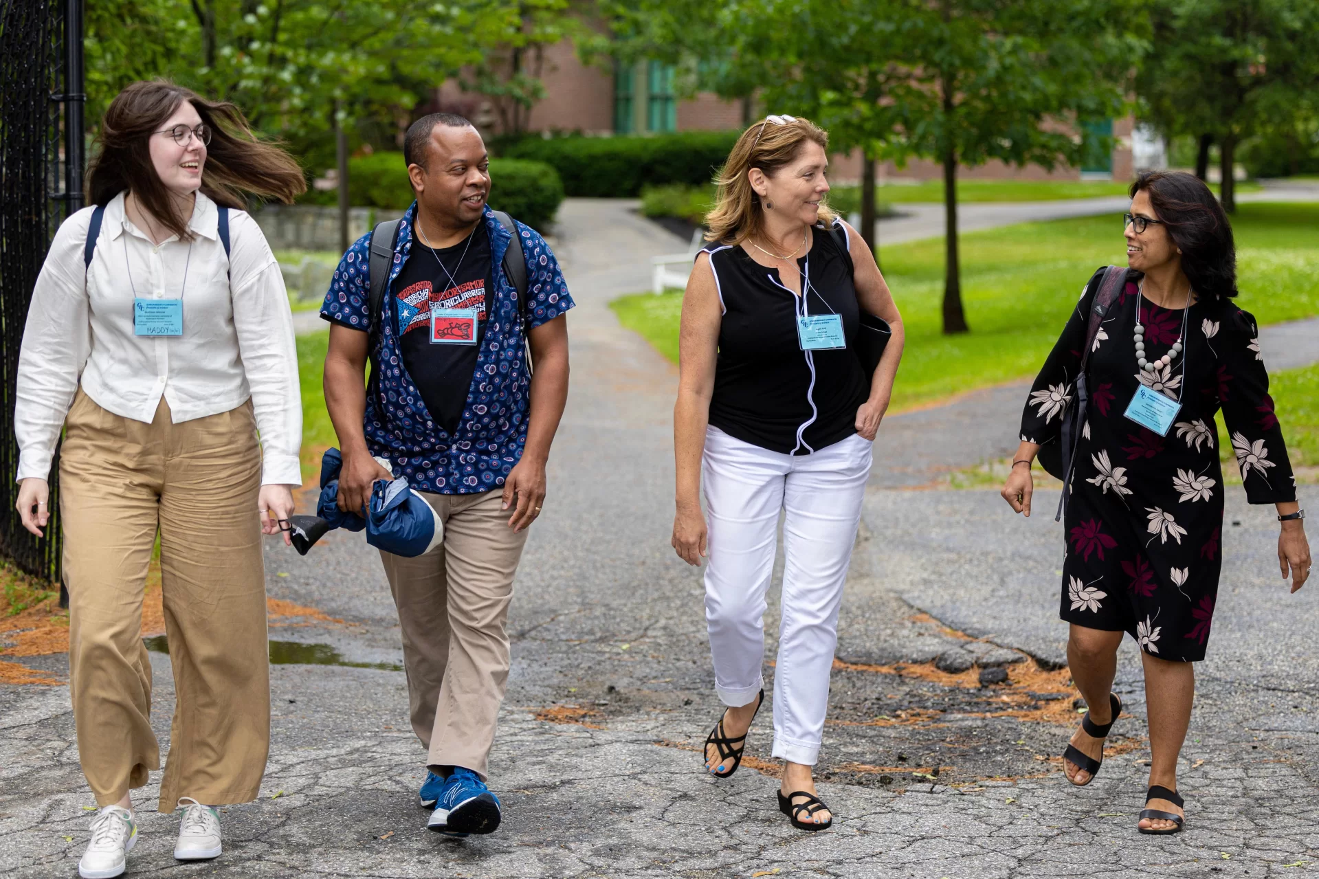 The nearly 200 educators from across the country who gathered this week at Bates College for the Gordon Research Conference came to share new research on ways to make biology education more inclusive, diverse, and accessible in a setting aimed at fostering intense and intimate collaboration.

From left, Gordon Research Conferences participants and biologists Madison (“Maddy”) Meuler of Allen Institute (current)/University of Washington (former), Omar Quintero of the University of Richmond, April Hill of Bates College, and Samiksha Raut of the University of Alabama at Birmingham head to lunch in Commons after a morning session in the Olin Arts Center.

Hill is Bates’ Wagener family professor of equity and inclusion in STEM