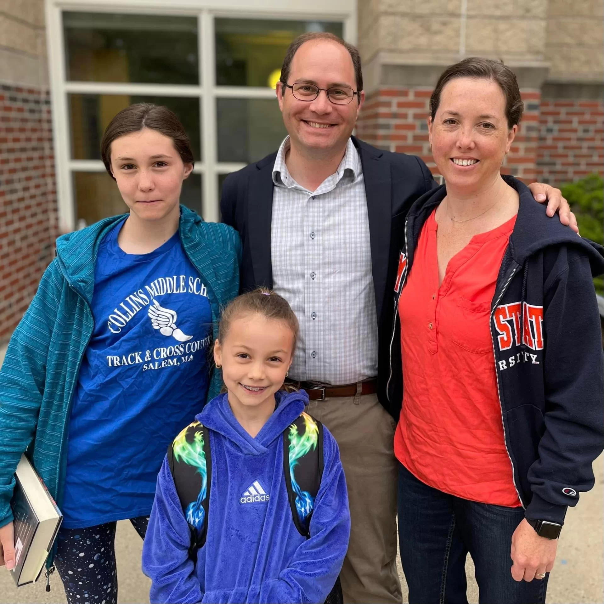 Dominick Pangallo '05 (center) with his wife, Kristin (Smith) Pangallo '02, and their two children, Aurelia (left) and Lucy.