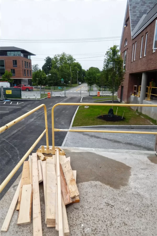 Once the Chase Hall loading dock, this concrete platform is being transformed into a patio. (Doug Hubley/Bates College)