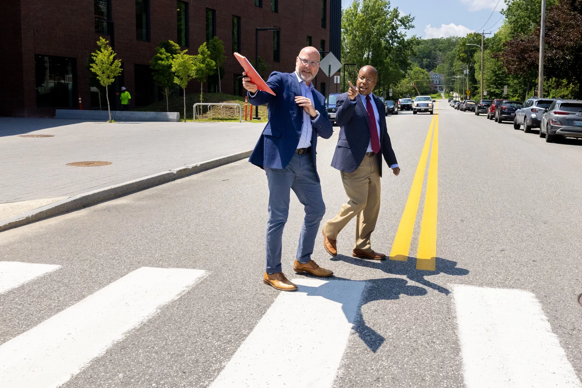 Vice President for Academic Affairs and Dean of the Faculty Malcolm Hill gives President Garry Jenkins a tour of various academic buildings on campus.

Day Five for the ninth Bates president — who officially became president on July 1 — was anything but a 9-to-5 affair, but instead a chance to explore the campus and meet as many folks as possible. After an early-morning walkthrough of Lane Hall, where he has his office, and the beverage break, provided by our Curb Cats food truck team, Jenkins took his first meal in Commons, a working lunch with faculty who are leading a few different academic initiatives.