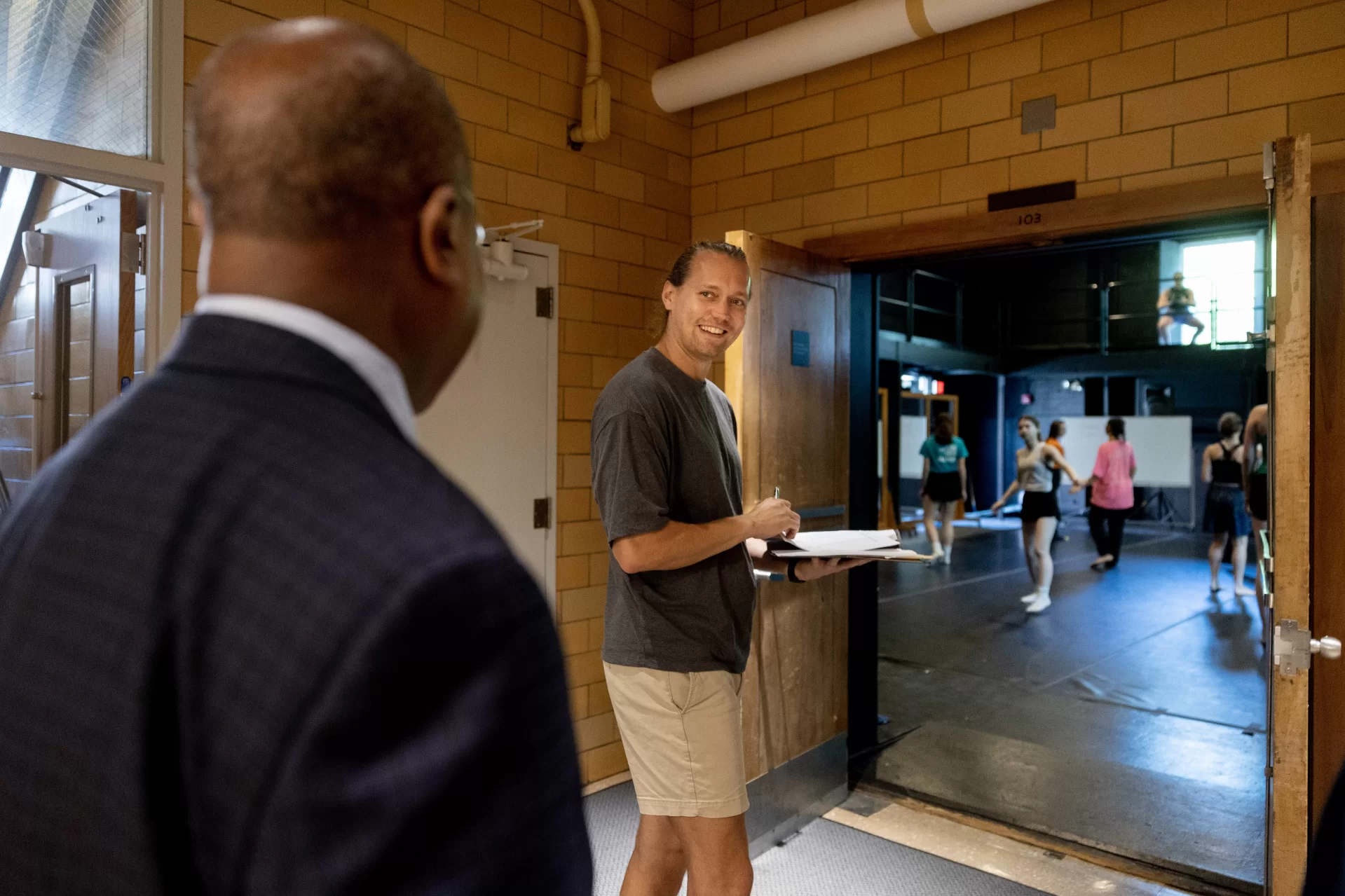 Vice President for Academic Affairs and Dean of the Faculty Malcolm Hill gives President Garry Jenkins a tour of various academic buildings on campus.

Day Five for the ninth Bates president — who officially became president on July 1 — was anything but a 9-to-5 affair, but instead a chance to explore the campus and meet as many folks as possible. After an early-morning walkthrough of Lane Hall, where he has his office, and the beverage break, provided by our Curb Cats food truck team, Jenkins took his first meal in Commons, a working lunch with faculty who are leading a few different academic initiatives.