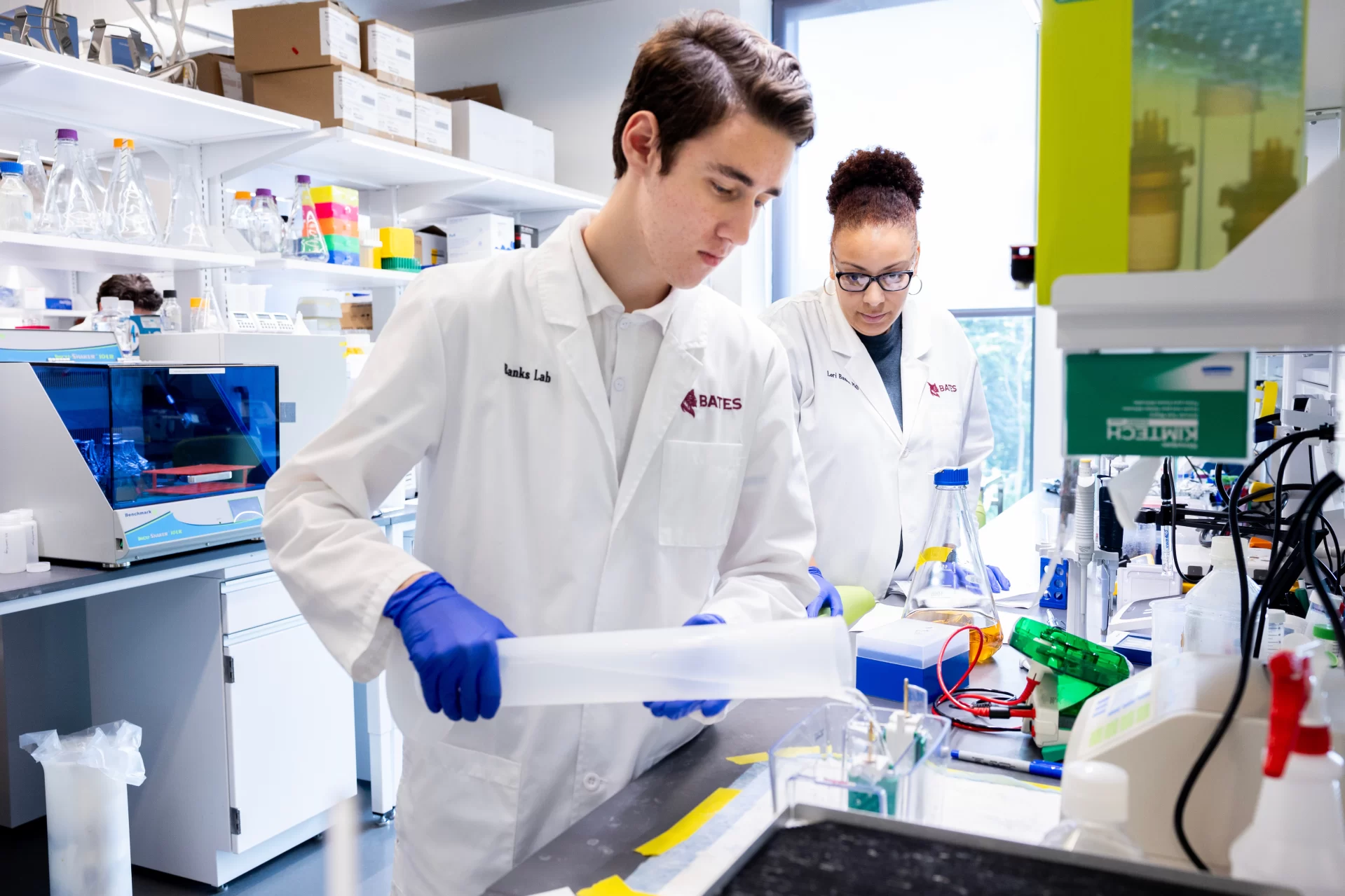 Assistant Professor of Biology works with a group of her summer research students in her Bonney Science Center lab on July 13, 2023.