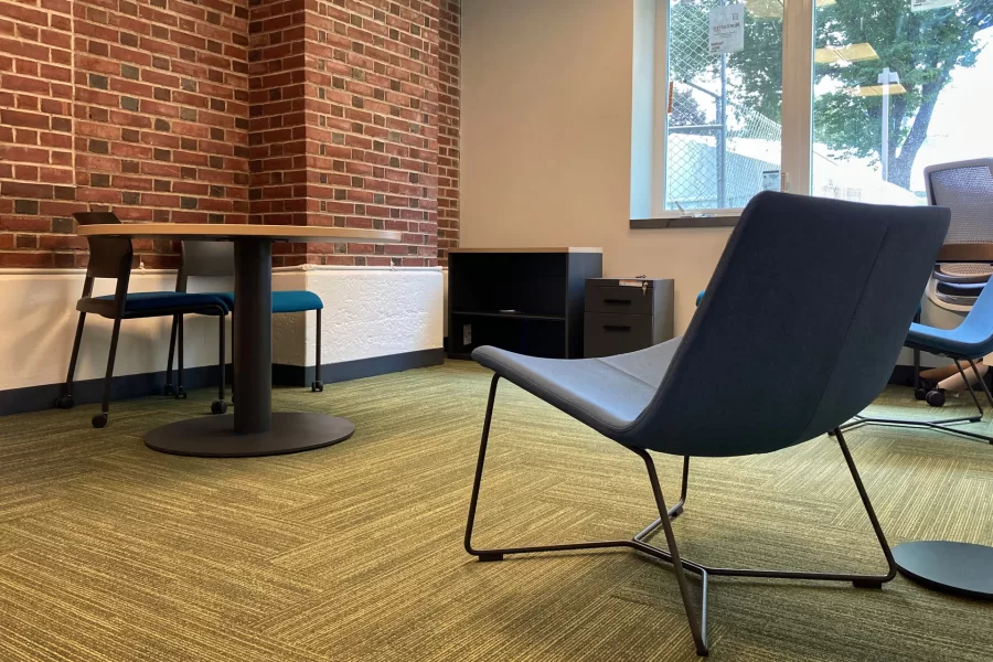 New paint, carpet, and furniture in a dean’s office in Chase Hall. (Doug Hubley/Bates College)