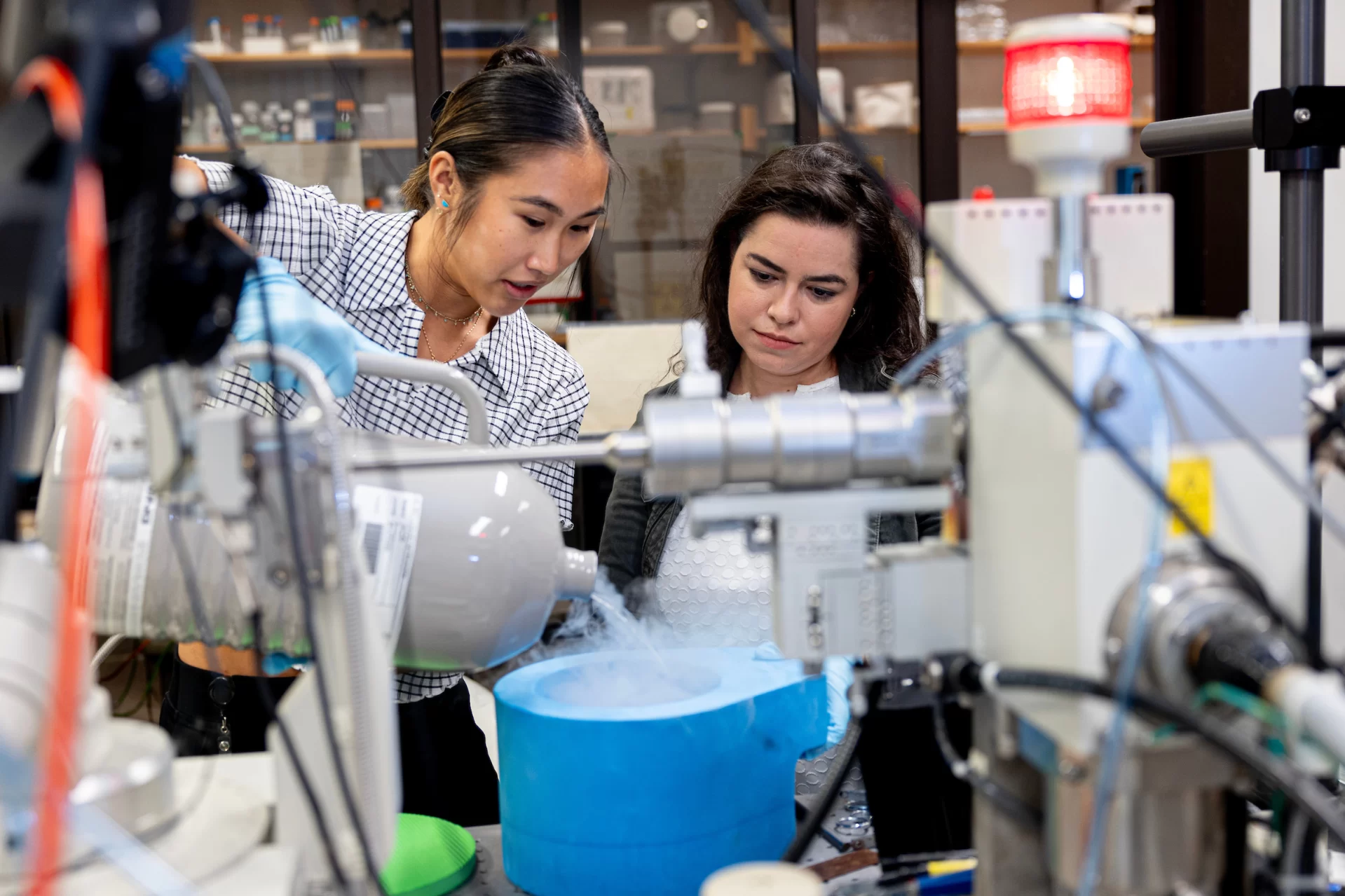 Nina Greeley ’24 of Scarborough, Maine, a double major in biological chemistry and mathematics, from has a Purposeful Work-funded internship at MIT in Cambridgeduring summer 2023.

Greeley is shown with her MIT mentor, Whitehead Fellow Lindsay Backman, at 31 Ames St., Cambridge, Mass., Building 68.

The Backman Lab studies the structure and biochemistry of proteins in anaerobic bacteria that are abundant in the human microbiome.

Backman received her PhD in chemistry from MIT in 2022, having earned a bachelor of science in chemistry, summa cum laude, from the University of Florida in 2015. As an undergraduate, she received honors including the University of Florida Presidential Service and University Scholars awards. She also participated in HHMI’s Exceptional Research Opportunities Program (EXROP) and its Capstone Award program – which both enable students from underrepresented backgrounds to work with a university professor to pursue summer research projects. Through those programs and the MIT Summer Research Program, she worked for two summers as a research assistant in the lab of Catherine Drennan, MIT professor of chemistry and biology and HHMI Investigator, who subsequently became Backman’s Ph.D. advisor.