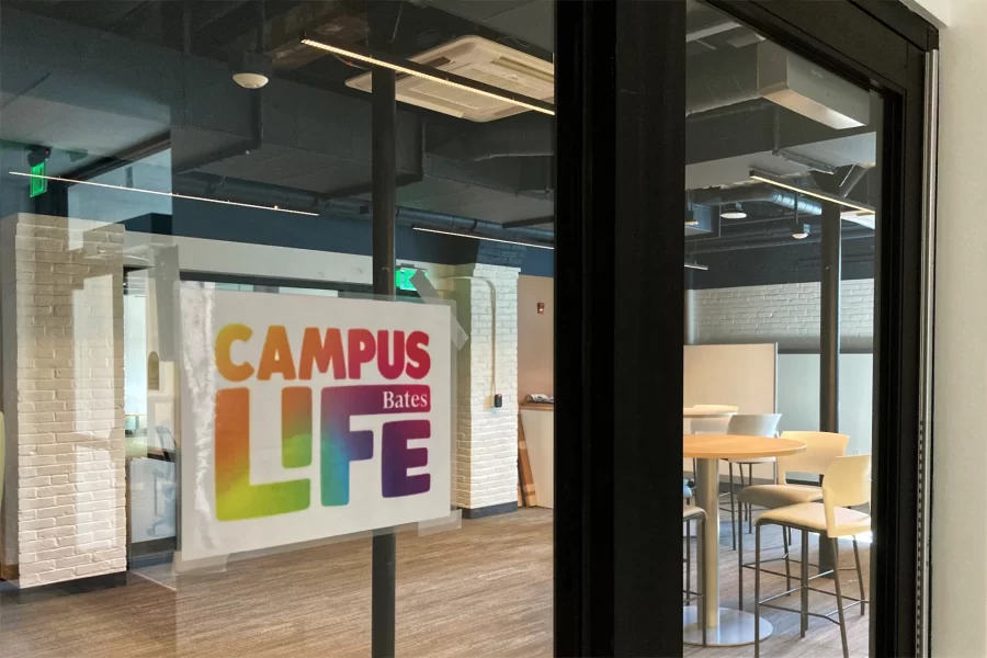 Through the student lounge behind the door is a suite of Campus Life offices — one of two such complexes newly constructed on Chase Hall’s lowest levels. (Doug Hubley/Bates College)