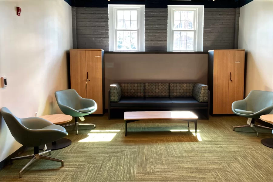 This seating area in the Student Affairs offices is situated about where art and stationery supplies were displayed in the College Store’s Chase Hall days. (Doug Hubley/Bates College)