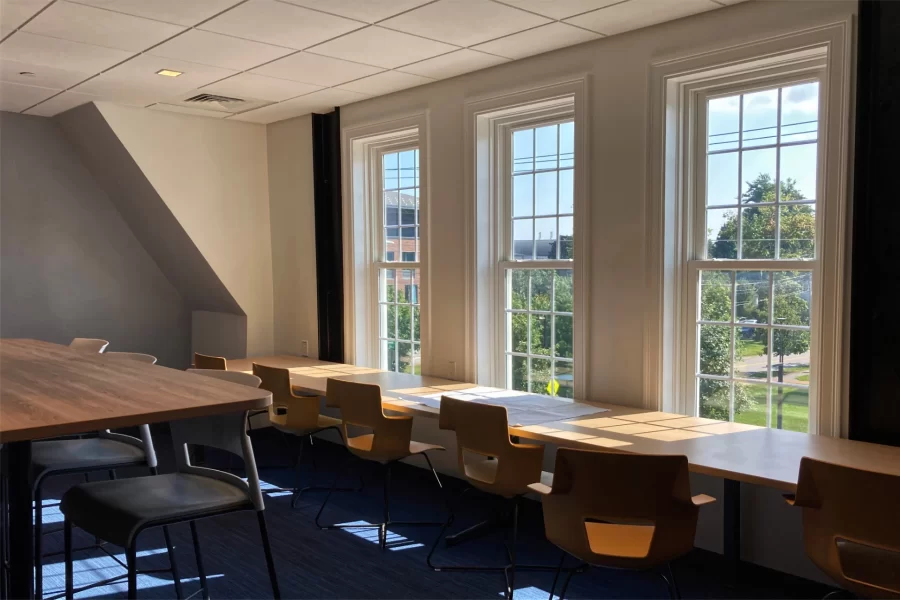 A study lounge on Chase Hall’s second floor has a great view of Campus Avenue. (Doug Hubley/Bates College)