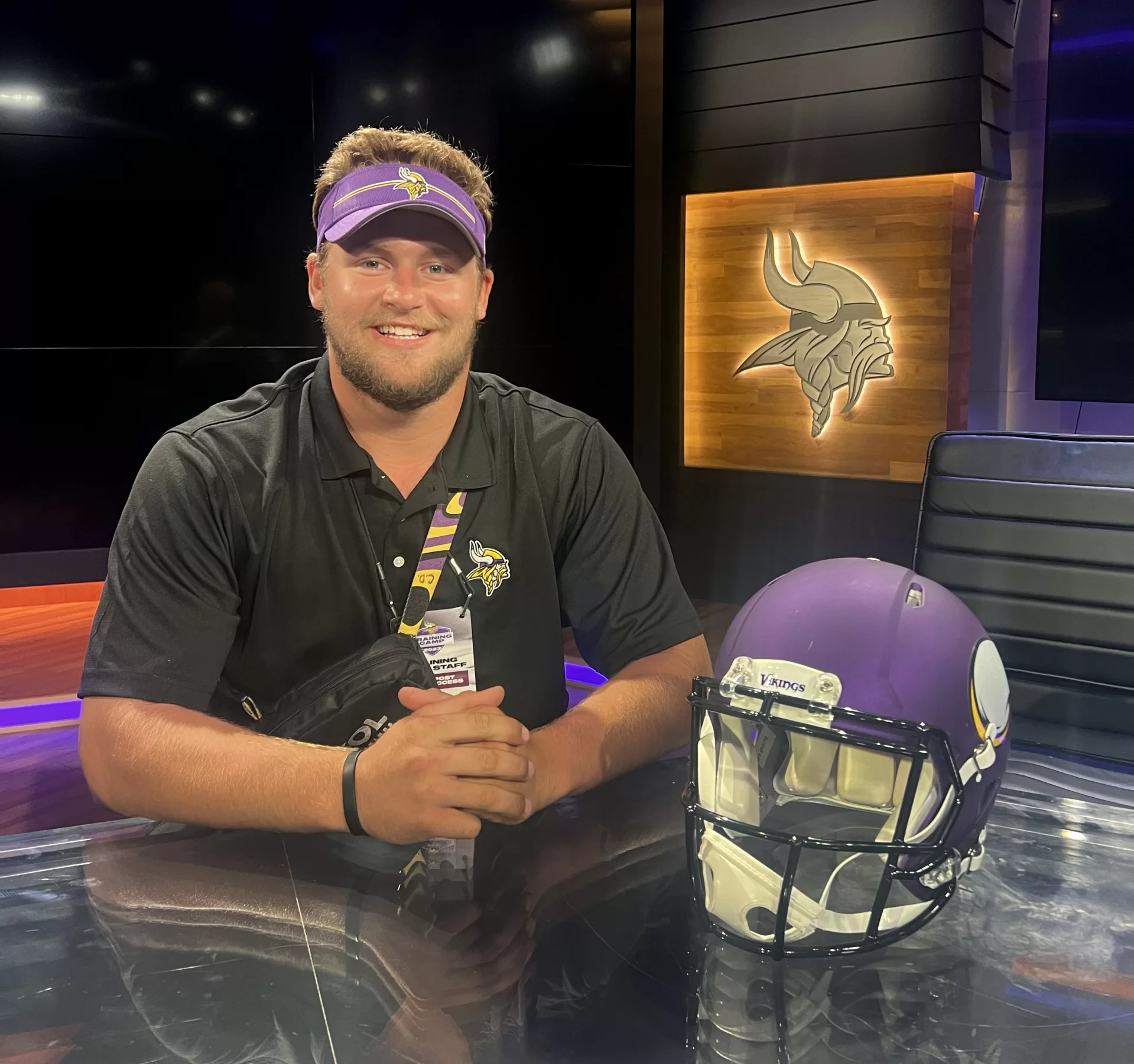 Cole De Magistris ’24, an economics and rhetoric, film, and screen studies double major from Emerson, N.J.


He had a purposeful work internship during August 2023 with the Minnesota Vikings training facility in Eagan, Minn. He was photographed here on Aug. 21, 2023.


Work: Supporting marketing, fan engagement, and guest services initiatives included with Fan Village, the Vikings’ fan experience program during training camp.