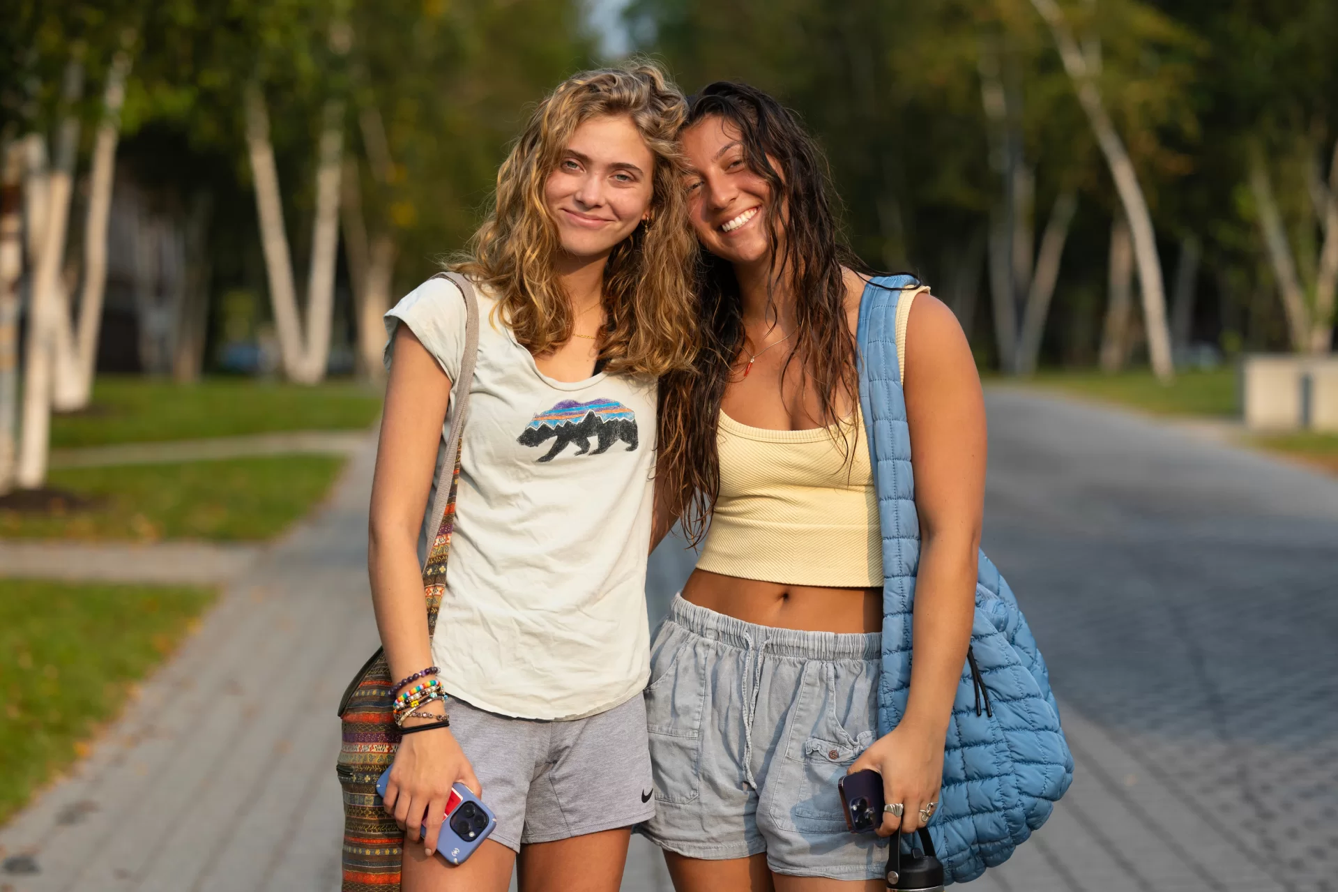 Lucy Sarno ‘27 of York, Maine, (t-shirt, blonde hair) and Simona Muscarella ’ 27 of Buffalo, N.Y., (tank top with brown hair) are on their way to breakfast in Commons on the morning of Sept. 6, 2023, the first day of classes. They met because they live across the hall from each other.
“I’m excited. It’s going to be good to have a routine,” Sarno said.