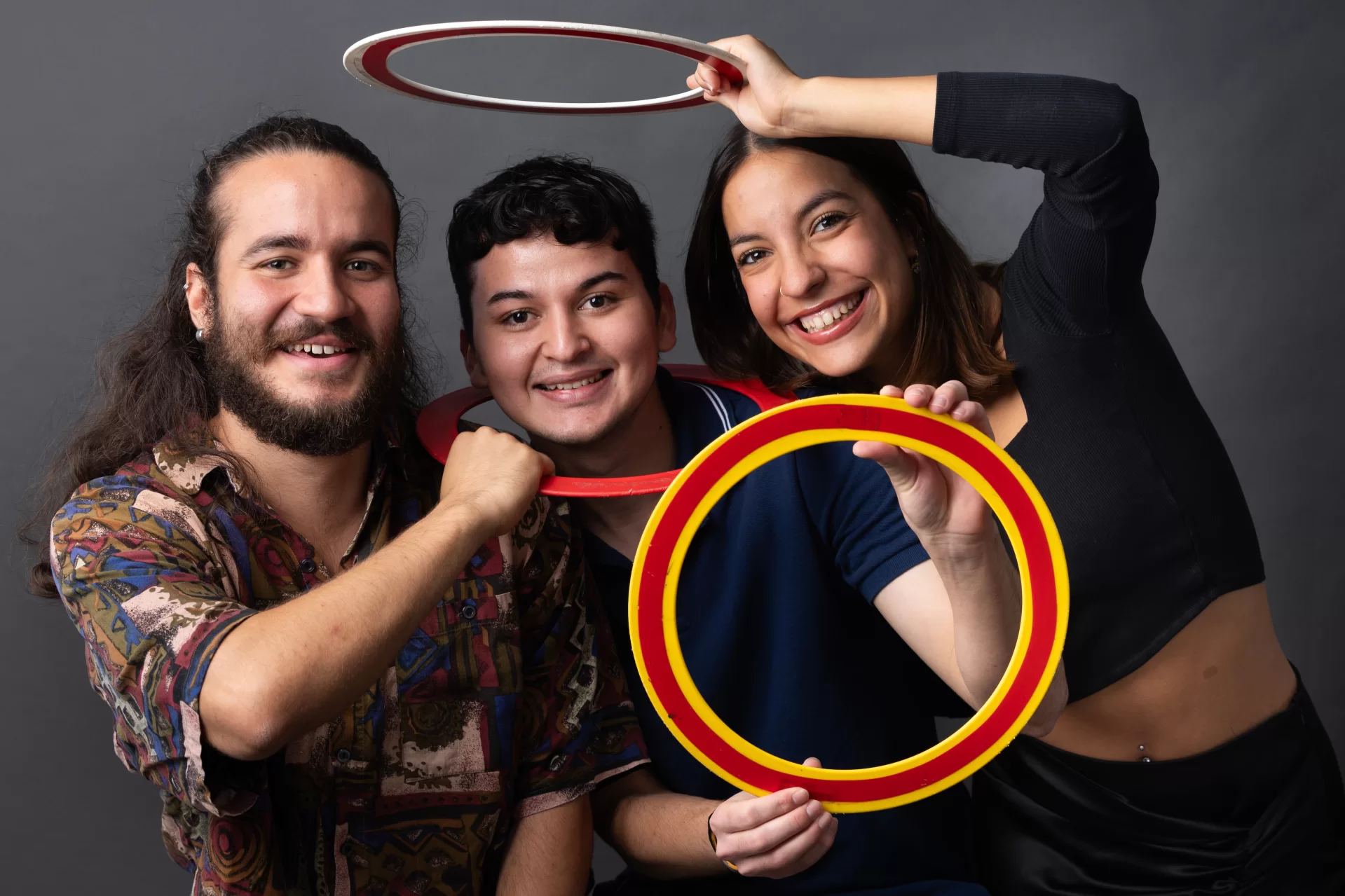 From left, United World Davis Scholars
Miguel Ángel Pacheco González '24 of Caracas, Venezuela '24 of Caracas, Venezuela; Maria Francisca Pereira Pinto Casteira da Rocha ’24 of Porto, Portugal, and Sebastian Fallas of Perez Zeledon, Costa Rica, pose for a group portrait after they had posed for individual head and shoulder photos. They used juggling rings belonging to Miguel, as props.