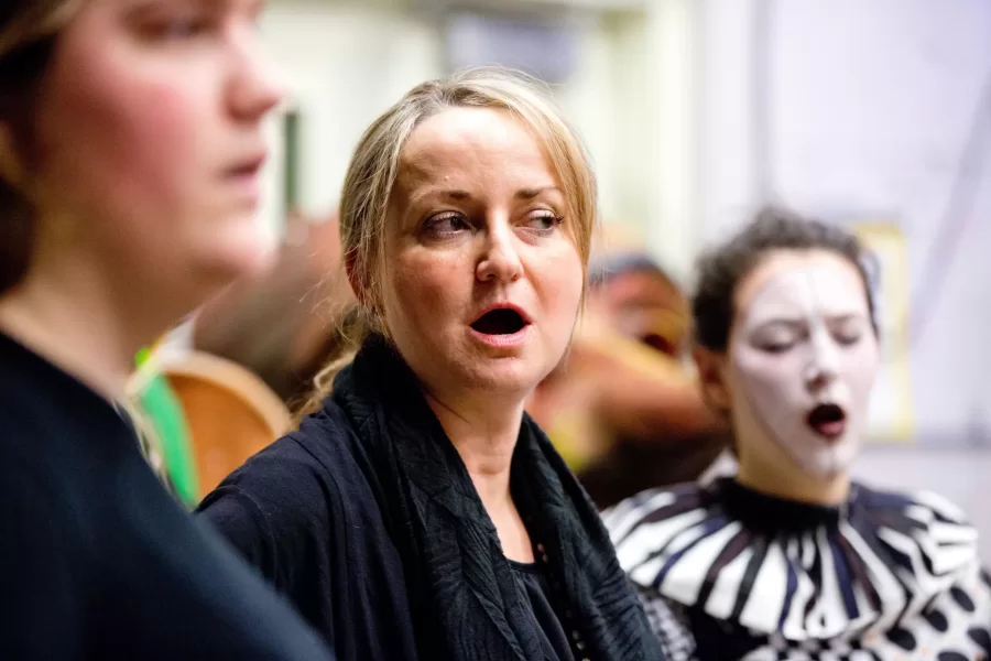 "As a teacher, I try to stay loose, light and fun by focusing on the joy of learning and creating. As a director, I expect professionalism, preparedness and dedication, while creating a safe, nurturing atmosphere for artistic experimentation."  

Katalin Vecsey, senior lecturer and vocal director for theater productions, conducting warm-up exercises backstage at Schaeffer Theatre, where will actors will appear “The Castle of Perseverance,” a medieval morality play directed and adapted by Max Pendergast ‘15 of Greenwich, Conn., for her senior thesis in theater, in performances at 7:30 p.m. Thursday, Friday and Monday, March 5, 6 and 9; and at 5 p.m. Saturday and 2 p.m. Sunday.