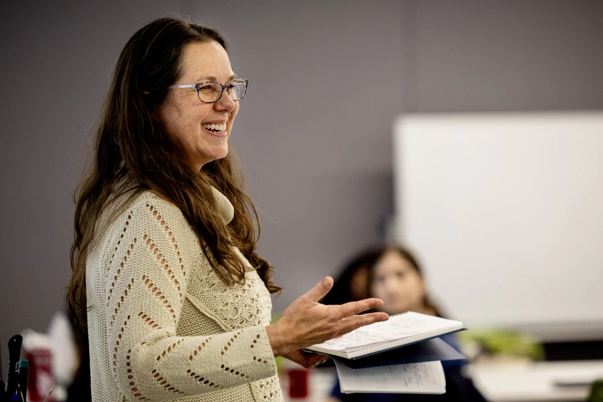 Aleisha Martinez Sandoval ’26 of of Edinburg, Texas, (left) and Caroline Cassell ’24 of Woodstock, Vt., listen in rapt attention to Otis speaker Nancy Campbell in a Dana Hall classroom as Campbell explains a writing exercise.

Campbell met with Director of Student Writing and Lecturer in Humanities Bridget Fullerton and the peer-writing tutors at 4:15 in Dana 204.