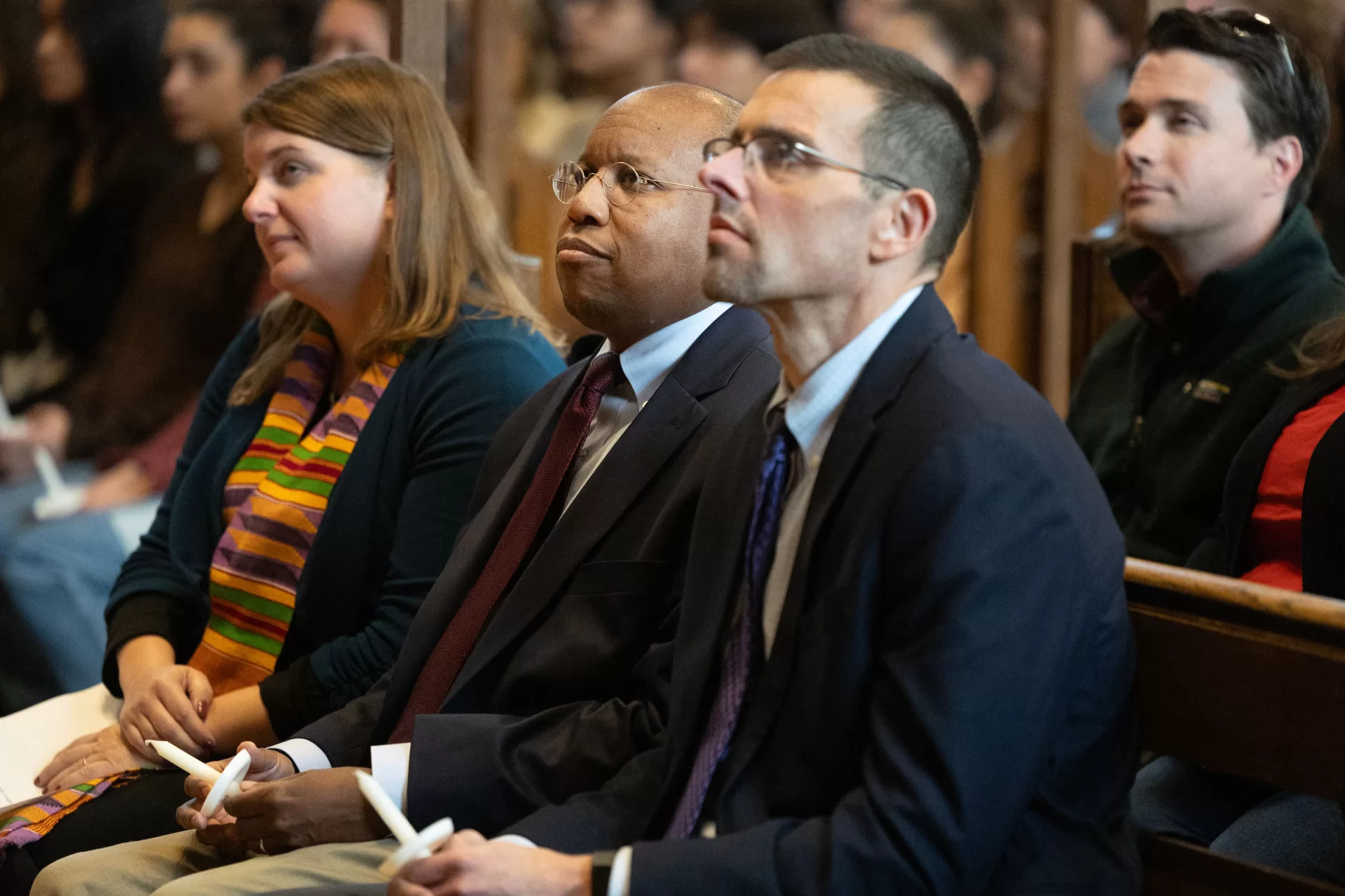 “The brightness that shines through the dark of a tragedy such as we have suffered here in Lewiston, our home, is what it always is in times like these: the immense capacity of our shared humanity,” said Bates President Garry W. Jenkins in his remarks during today’s Vigil for Grief and Remembrance, held at 4:30 p.m. in Gomes Chapel on the one-week anniversary of the shootings in Lewiston. Led by the Rev. Brittany Longsdorf, the college’s multifaith chaplain, the vigil gave the campus community an opportunity to come together for silence, candle lighting, poetry, and interfaith prayers, and, ultimately, to share communal grief with their Lewiston community. Welcome & Naming Grief: Brittany Longsdorf, Multifaith Chaplain and Visiting Lecturer in the Humanities Bates President Garry W. Jenkins Remarks Lewiston Mayor Carl Sheline’s Remarks Invitation for Sharing: Brittany Longsdorf *Barry Music* (single floor mic, guitar output) Reading of the Names: Brittany Longsdorf and Raymond Clothier, associate multifaith chaplain • Tricia C. Asselin • Peyton Brewer-Ross • William Frank Brackett • Thomas Ryan Conrad • Michael R. Deslauriers II • Maxx A. Hathaway • Bryan M. MacFarlane • Keith D. Macneir • Ronald G. Morin • Joshua A. Seal • Arthur Fred Strout • Stephen M. Vozzella • Lucille M. Violette • Robert E. Violette • Joseph Lawrence Walker • Jason Adam Walker • William A. Young • Aaron Young *moment of silence* & closing, begin to pass candle lighting READINGS (all from Lectern mic unless noted) Aneeza Ahmad ‘25 of Sharon, Mass., and Alaina Rauf ‘25 of Yarmouth, Me., of the Bates Muslim Student Association Sophie Leight ‘26 of Easton, Md. Venerable Tenzin Dasel, ‘88 - volunteer spiritual advisor and founder of the Maine Mindfulness Project and is an active retreat leader and speaker in the International Network of Engaged Buddhists Levi Mindlin ‘24 of Portland, Ore - song (single floor mic, guitar output)