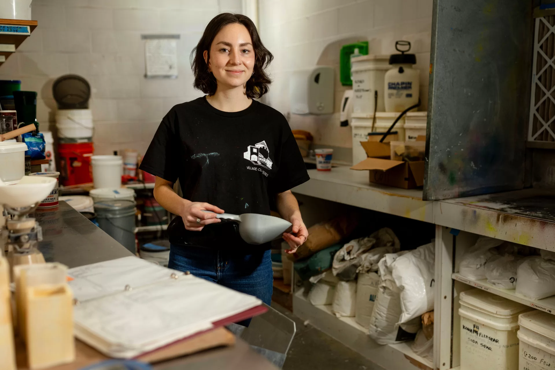 For a Q&A with student employee Alex Provasnik '25 of Arlington, Va., on cooking with chemistry in the glaze kitchen. She is a double major in art and visual culture and chemistry, shown in the glaze kitchen and with the kilns with Lecturer in Art and Visual Culture Susan Dewsnap.